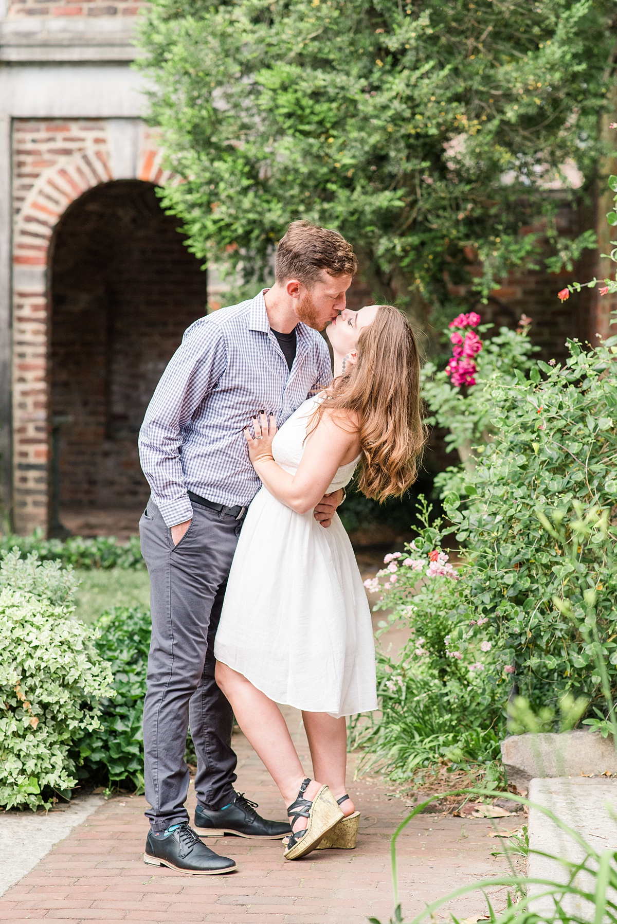 Beautiful Dip Kiss During Edgar Allen Poe Museum Engagement Session in Downtown Richmond. Photography by Richmond Wedding Photographer Kailey Brianne Photography. 
