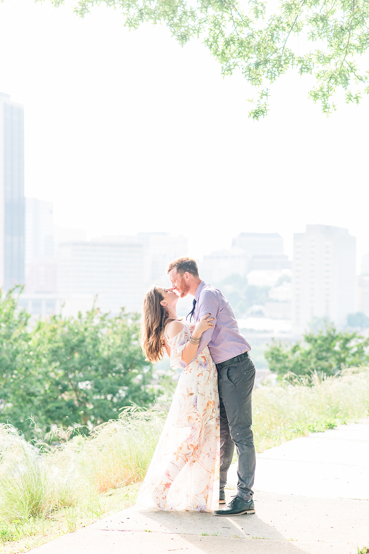 City Skyline View During Jefferson Park Engagement Session in Downtown Richmond. Photography by Charlottesville Wedding Photographer Kailey Brianne Photography. 