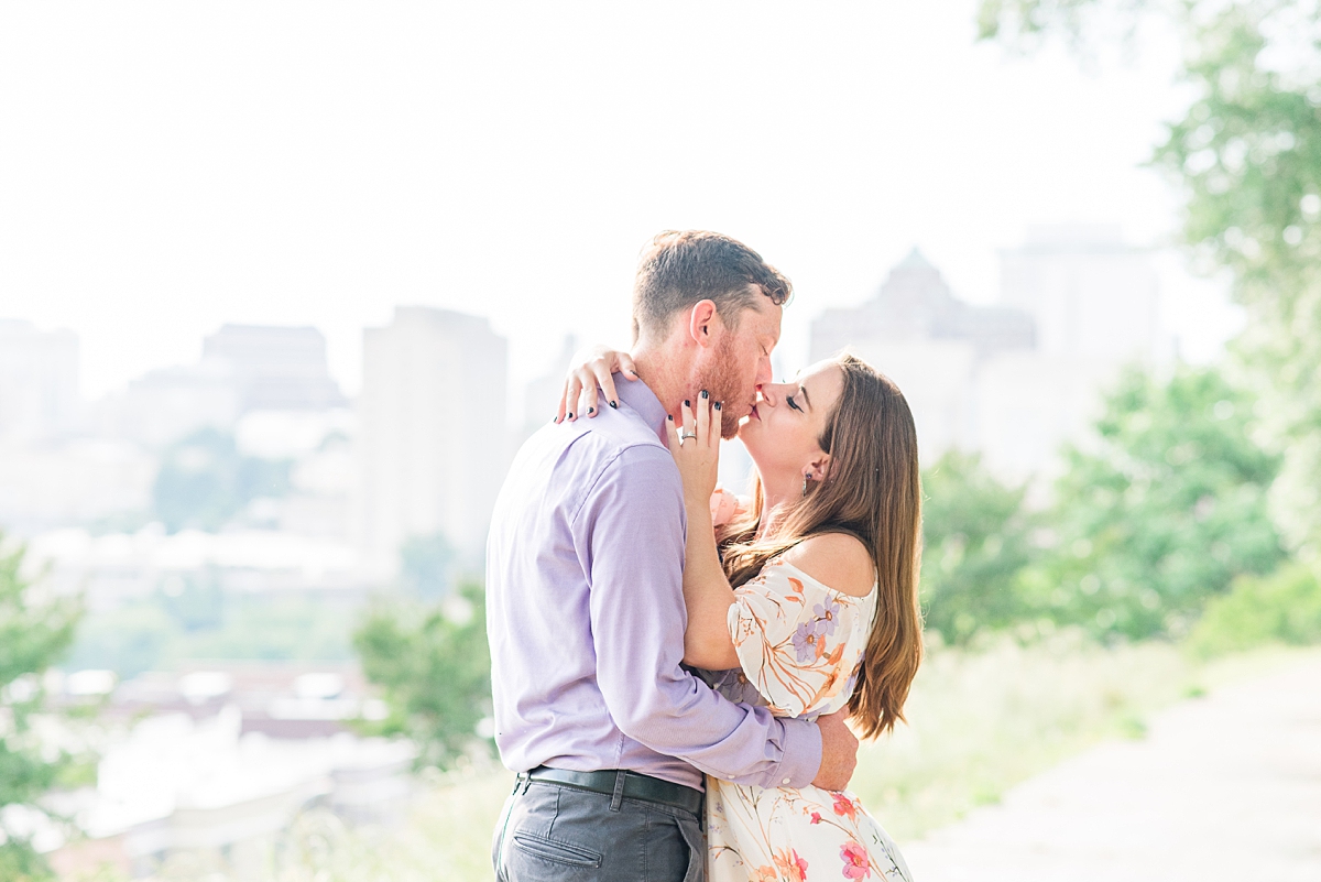 City Skyline View During Jefferson Park Engagement Session in Downtown Richmond. Photography by Charlottesville Wedding Photographer Kailey Brianne Photography. 