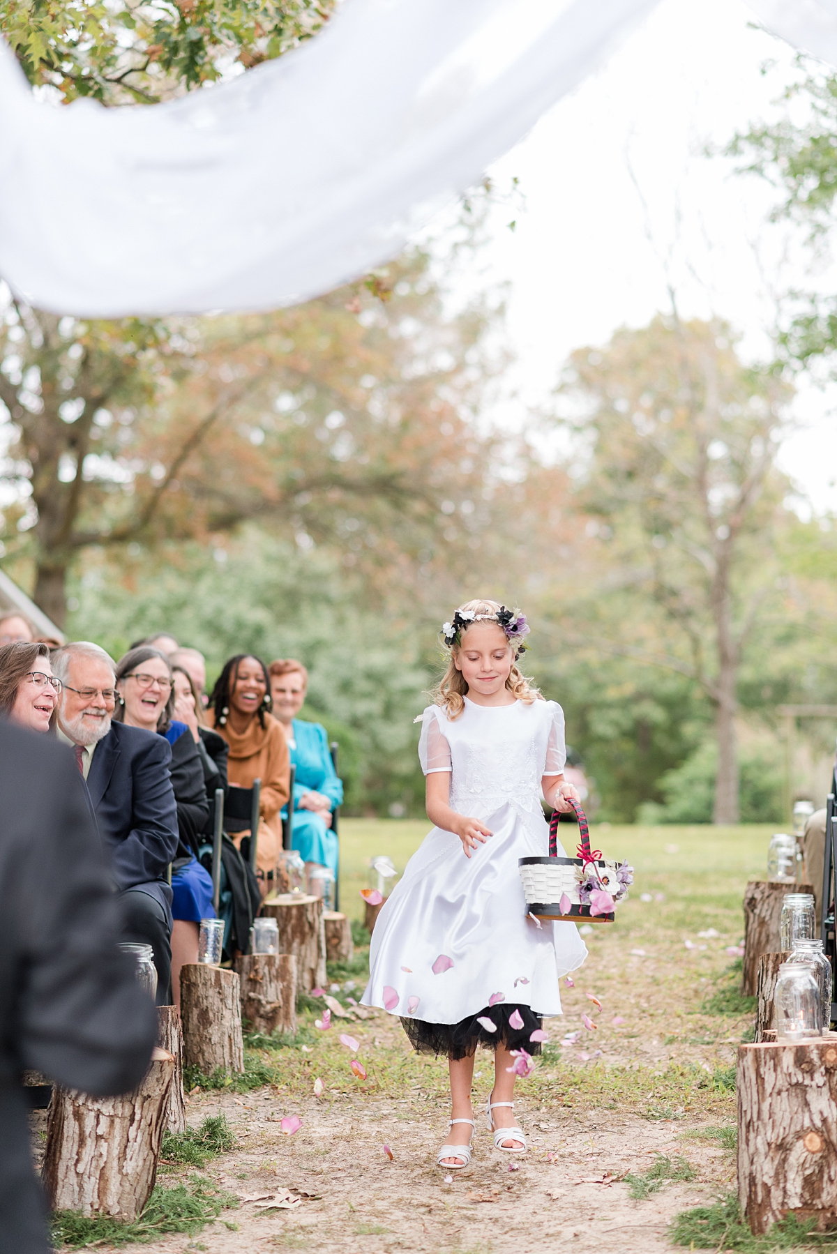 Flower Girl at Alternative Ceremony at Lake Gaston Fall Wedding. Wedding Photography by Richmond Wedding Photographer Kailey Brianne Photography.