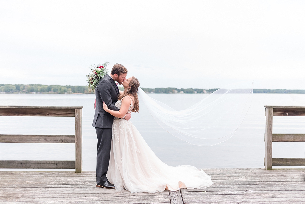 Bride and Groom Portraits with Veil at Lake Gaston Fall Wedding. Wedding Photography by Richmond Wedding Photographer Kailey Brianne Photography. 
