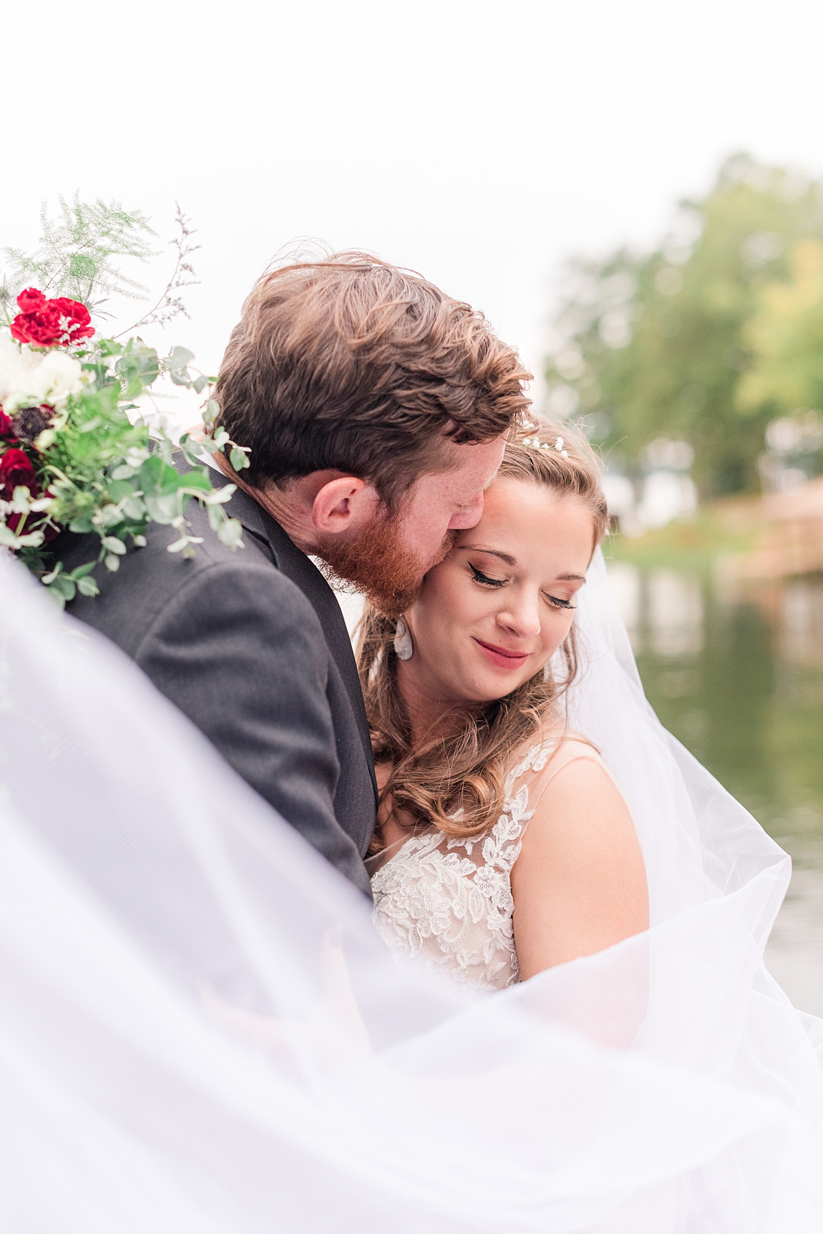 Bride and Groom Portraits with Veil at Lake Gaston Fall Wedding. Wedding Photography by Richmond Wedding Photographer Kailey Brianne Photography. 