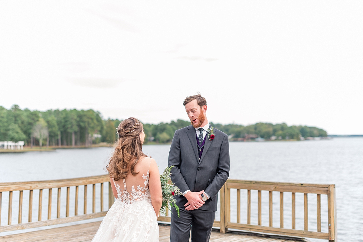 Bride and Groom First Look Portraits with Lake View  at Lake Gaston Fall Wedding. Wedding Photography by Richmond Wedding Photographer Kailey Brianne Photography. 