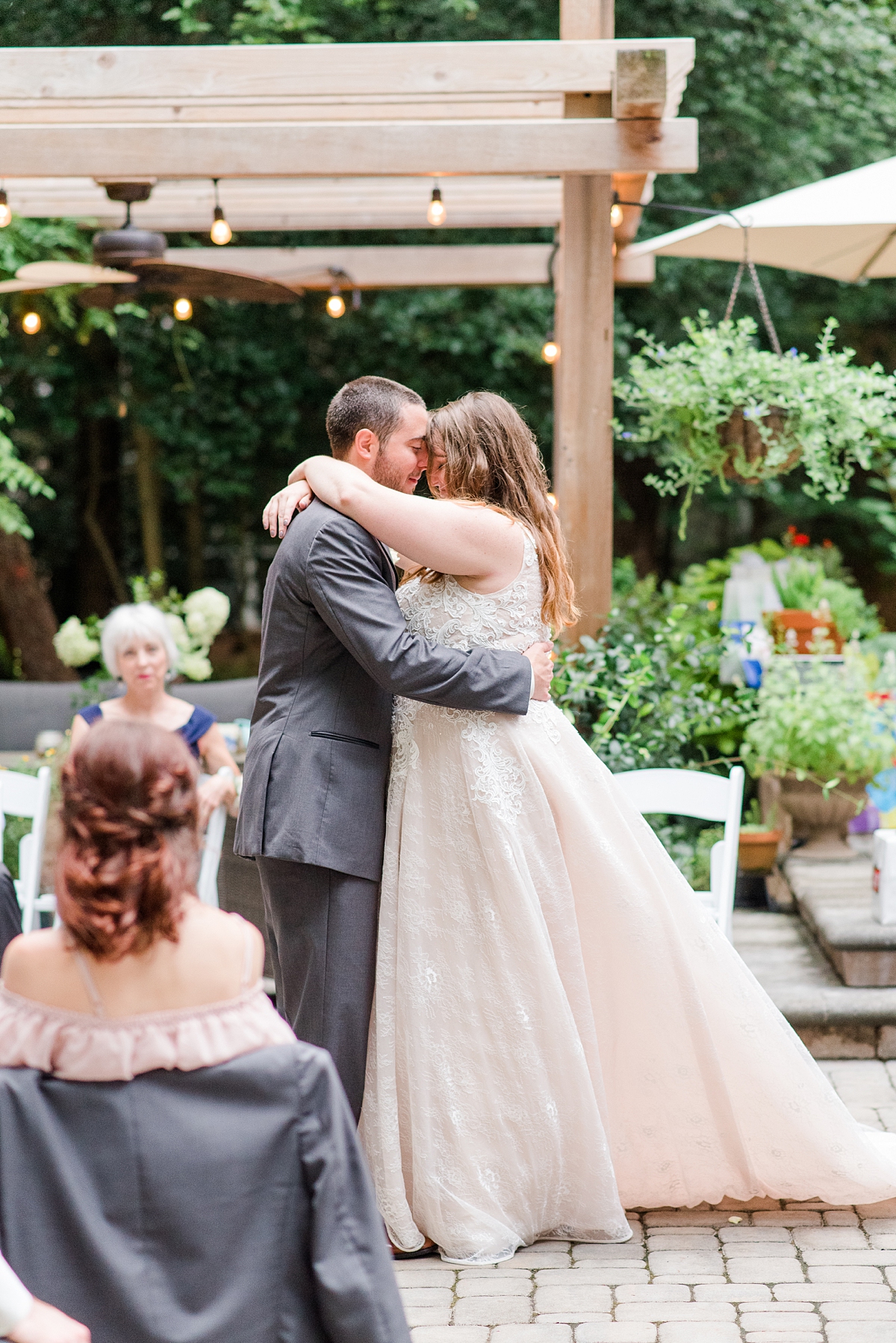First Dance at Yorktown Backyard Intimate Wedding Reception. Wedding Photography by Richmond Wedding Photographer Kailey Brianne Photography. 