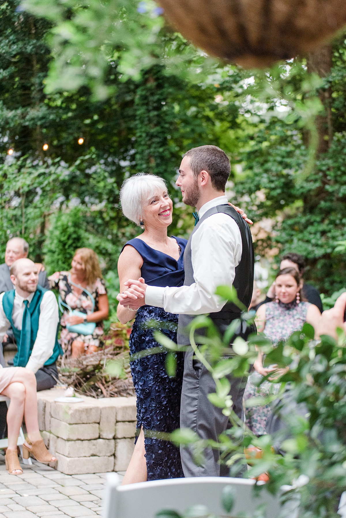 Mother Son Dance at Yorktown Backyard Intimate Wedding Reception. Wedding Photography by Richmond Wedding Photographer Kailey Brianne Photography. 