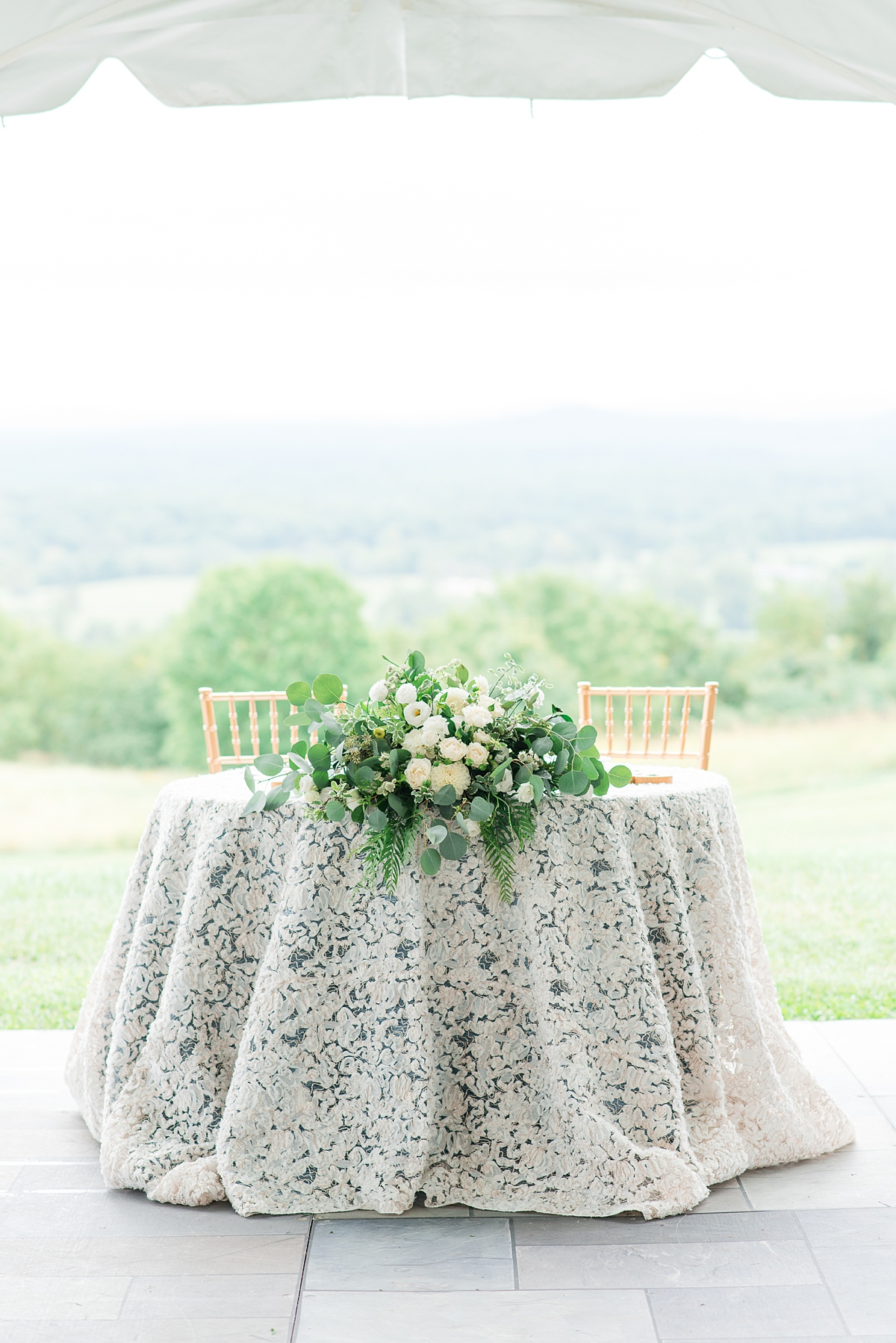 Bride and Groom Table Wedding Reception Decor with Mountain View at a Timeless Grace Estate Winery Wedding. Wedding Photography by Richmond Wedding Photographer Kailey Brianne Photography.