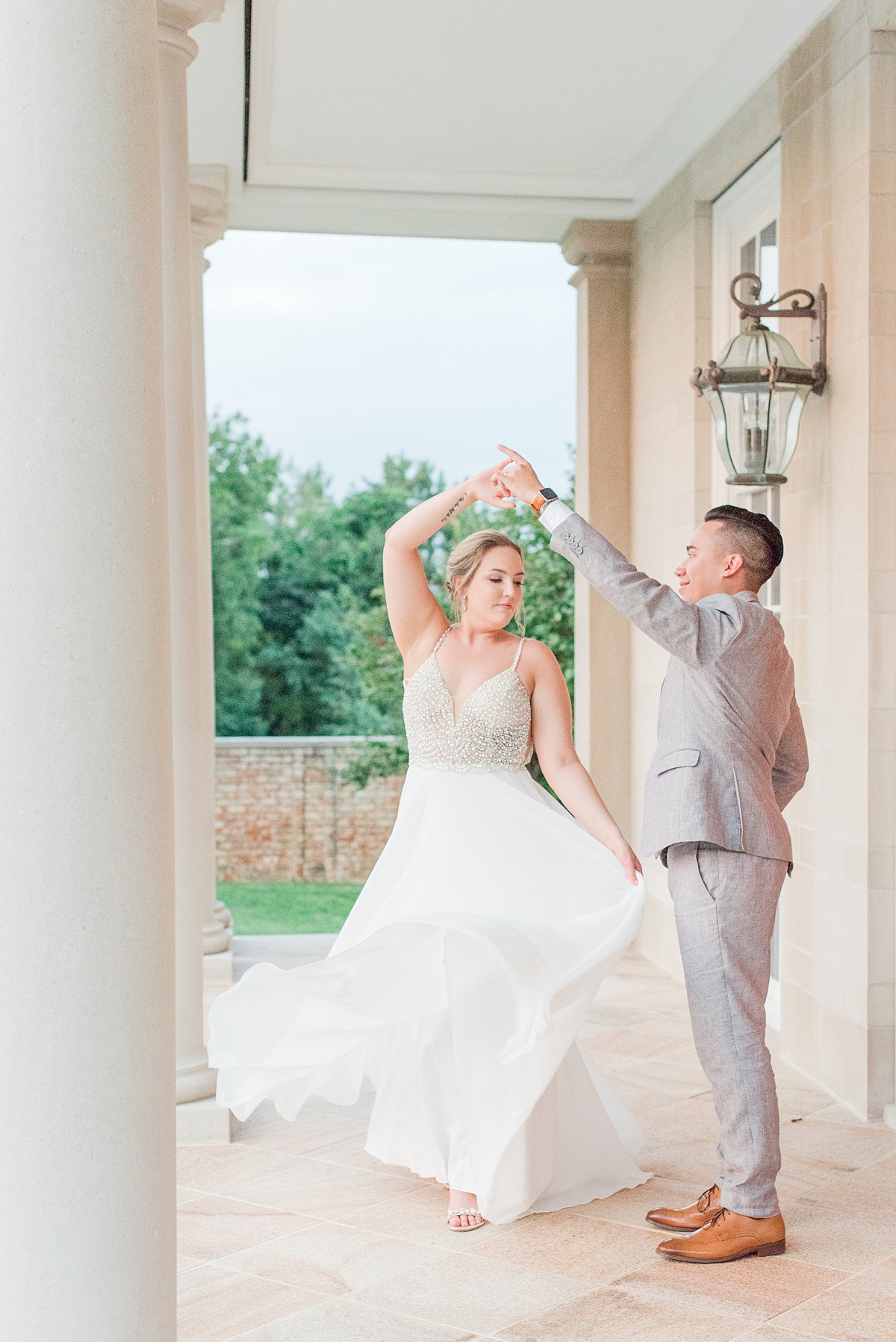 Twirling Bride and Groom Portraits in Reception Dress with a Mountain View at a Grace Estate Winery Wedding. Wedding Photography by Richmond Wedding Photographer Kailey Brianne Photography.
