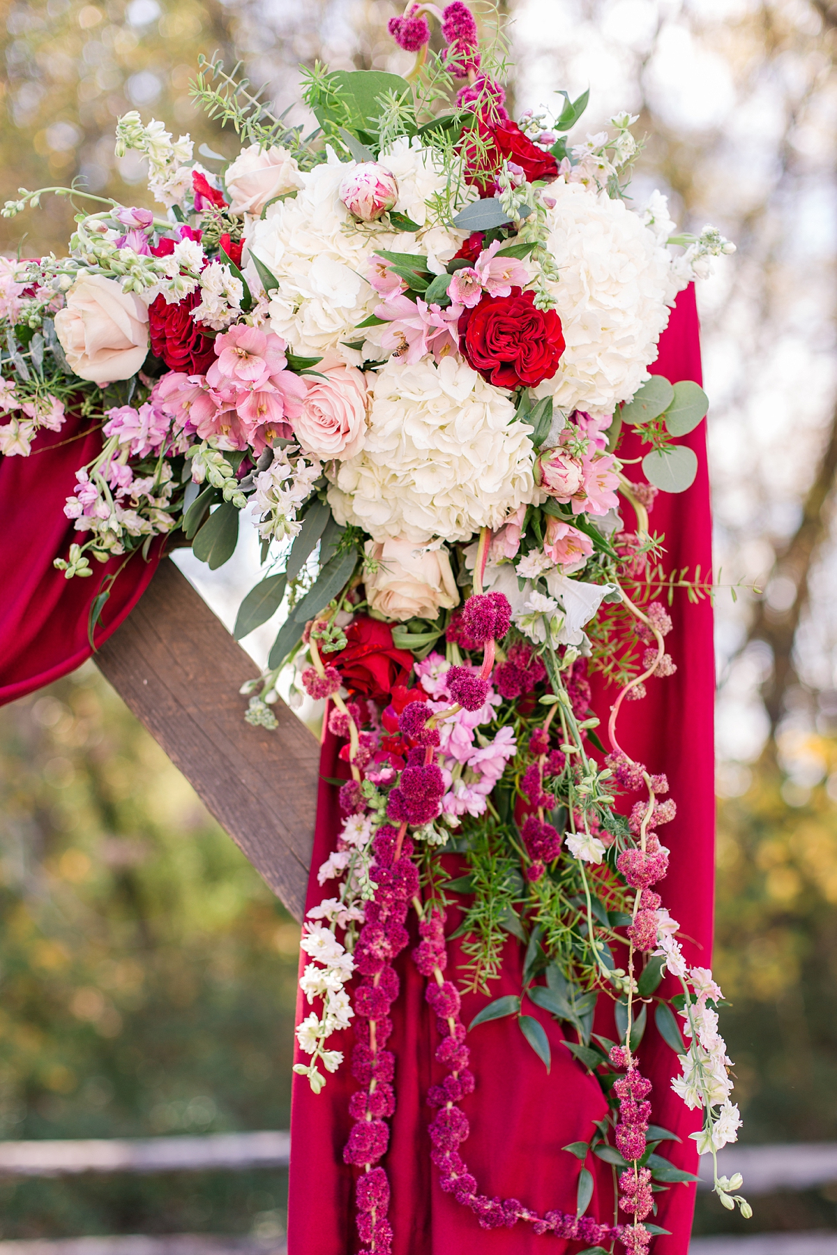 Ceremony Arch Florals at Hanover Tavern Fall Wedding. Wedding Photography by Richmond Wedding Photographer Kailey Brianne Photography. Florals by Lavender Lane Flowers & Gifts