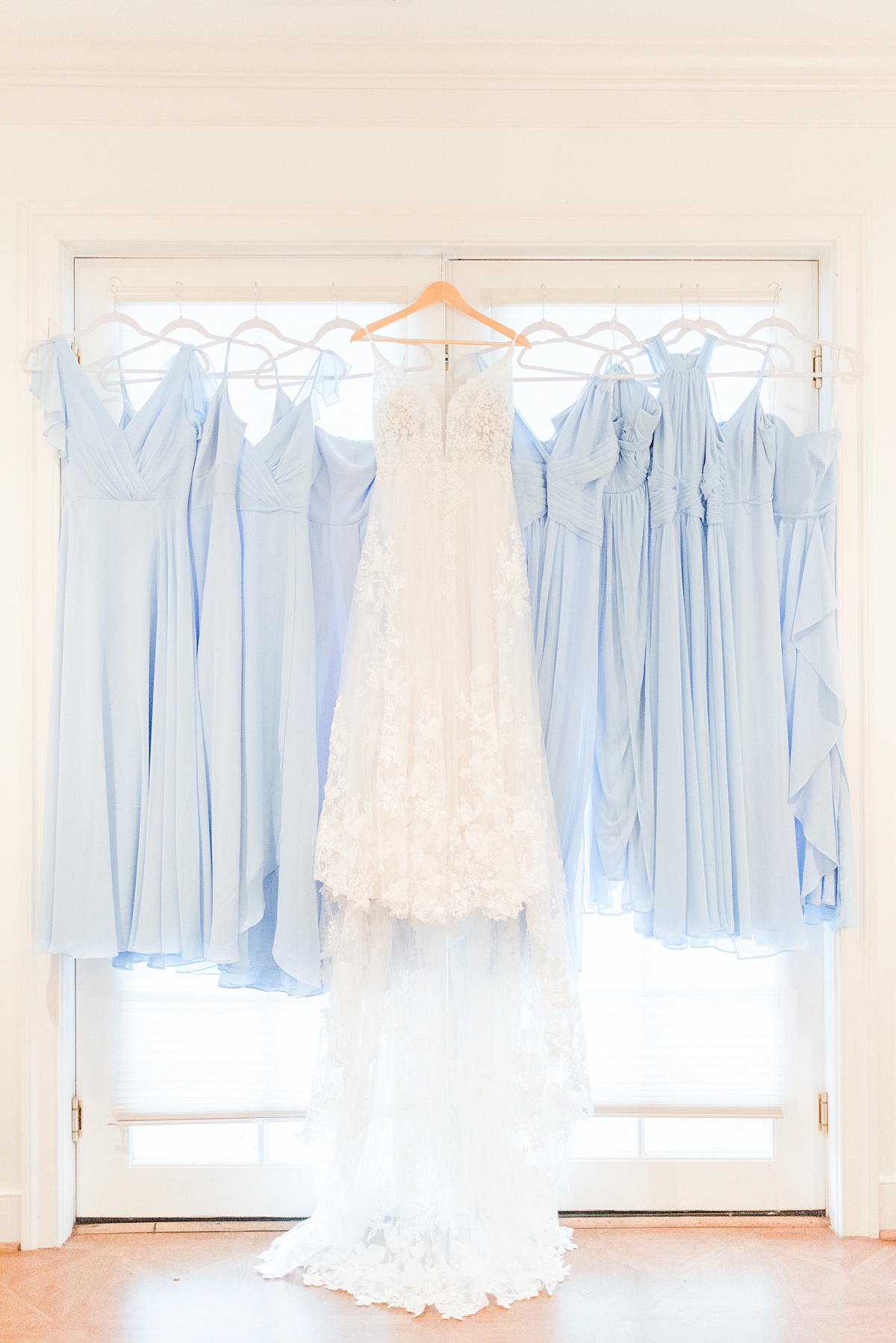 Wedding Dress and Bridesmaid Dresses Hanging at Grace Estate Winery Summer Wedding. Wedding Photography by Richmond Wedding Photographer Kailey Brianne Photography. 