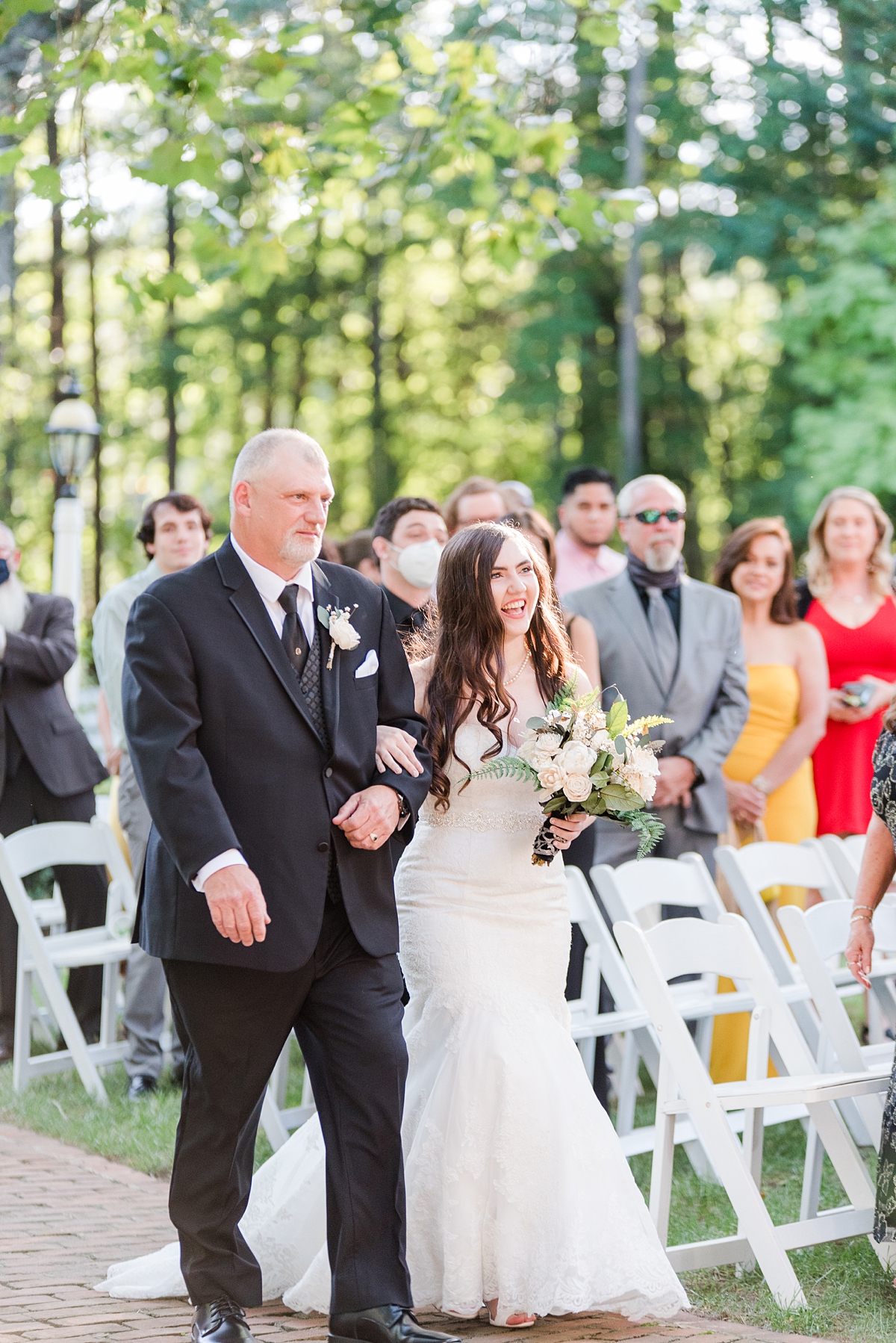 Bride Walking Down the Aisle at Virginia Cliffe Inn Summer Wedding Ceremony. Wedding Photography by Richmond Wedding Photographer Kailey Brianne Photography. 