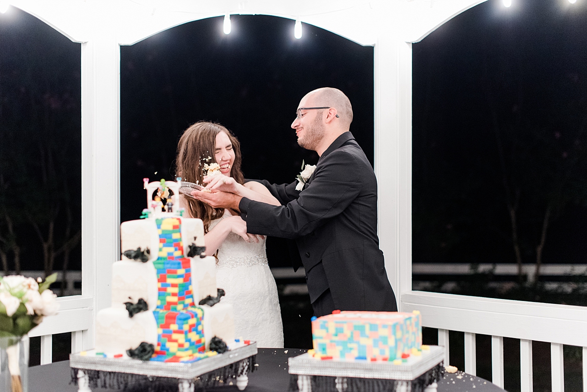 Exciting Cake Cutting and Face Smashing at Virginia Cliffe Inn Summer Wedding Reception. Wedding Photography by Richmond Wedding Photographer Kailey Brianne Photography. 