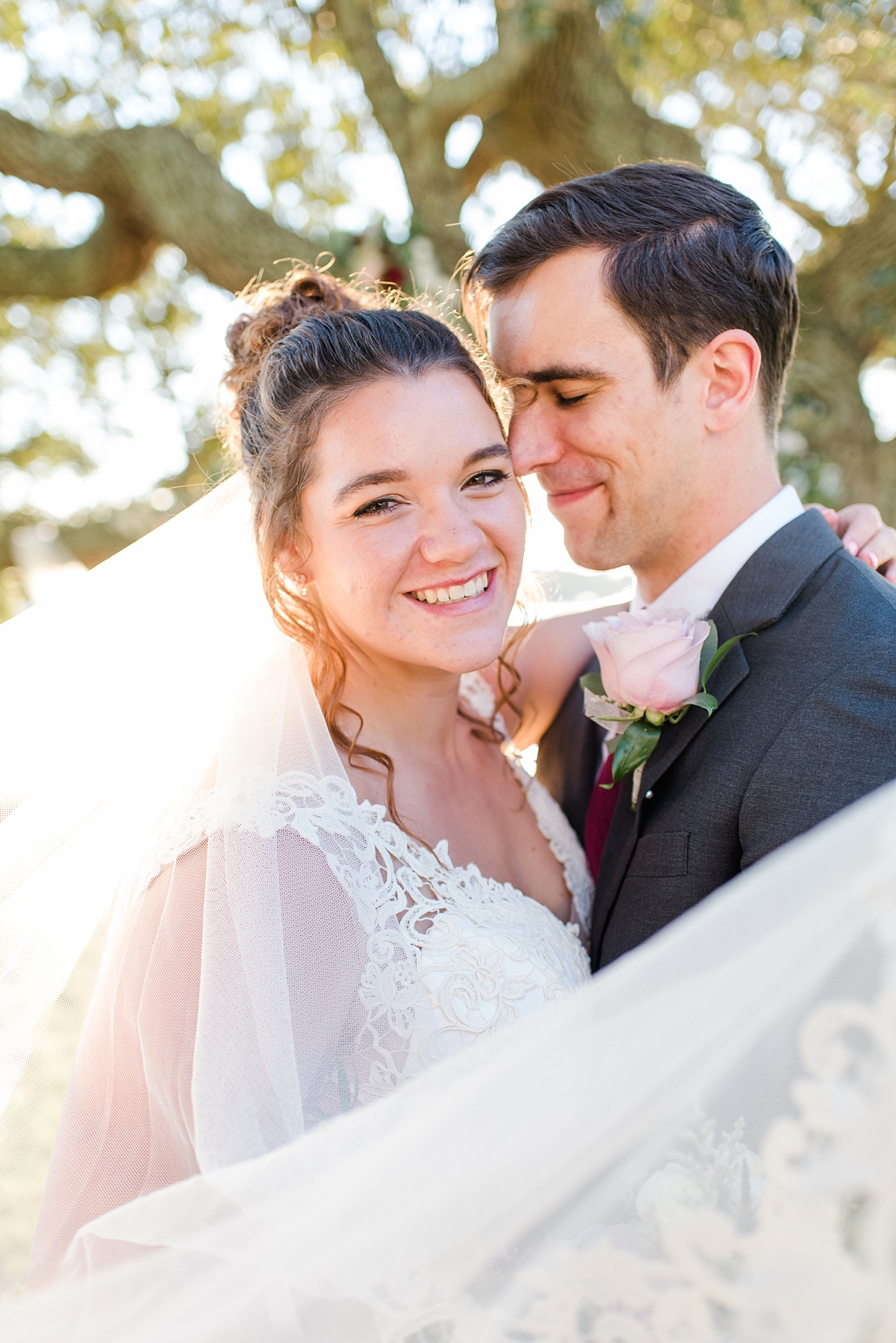 Bride and Groom Portraits with Veil at Lake Front Fall Wedding. Wedding Photography by Richmond Wedding Photographer Kailey Brianne Photography. 