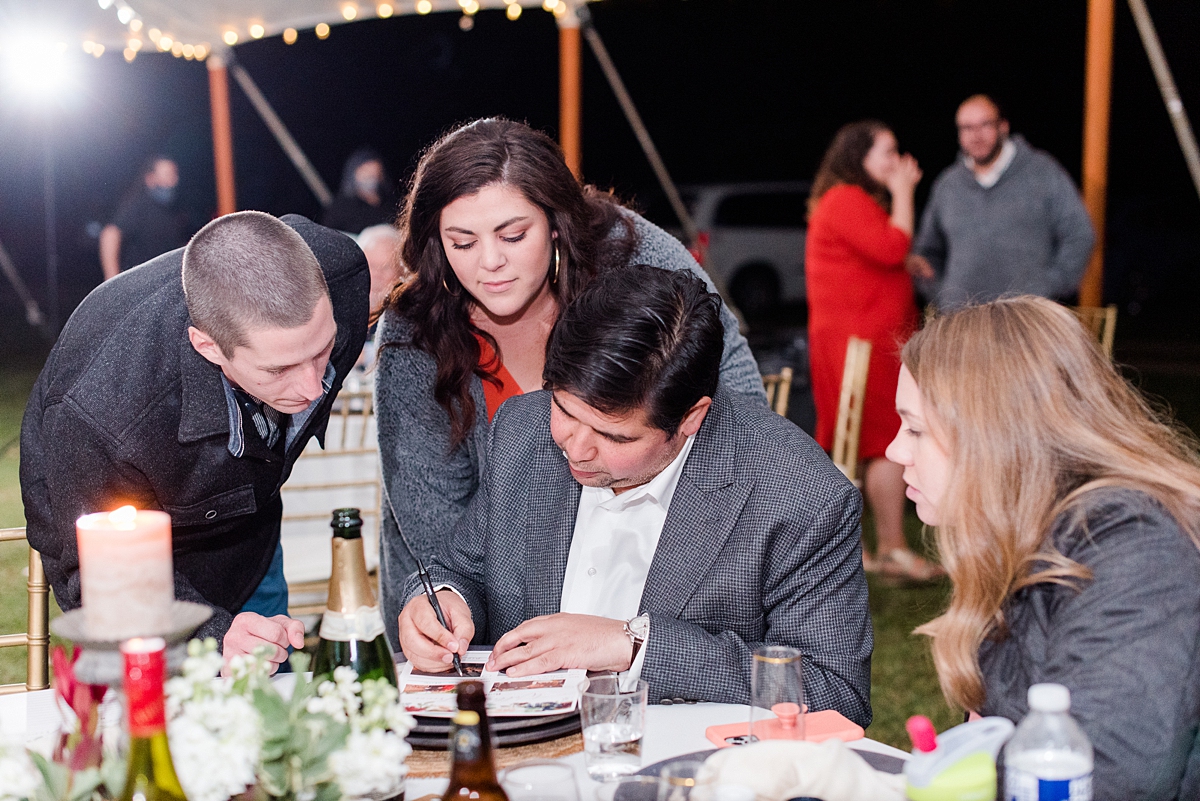 Trivia at Fall Lake Front Wedding Reception. Wedding Photography by Yorktown Wedding Photographer Kailey Brianne Photography. 