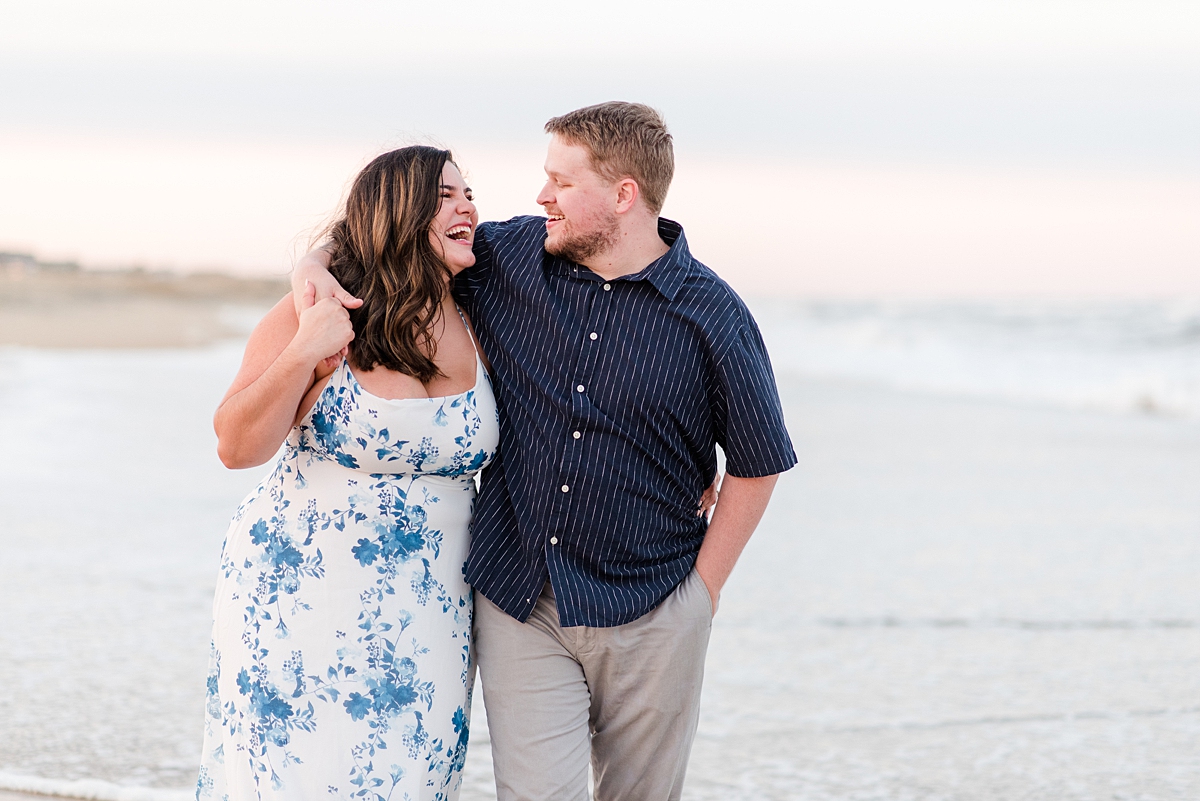 Couple Walking in the Water at Virginia Beach Engagement Session. Engagement Photography by Yorktown Wedding Photographer Kailey Brianne Photography. 