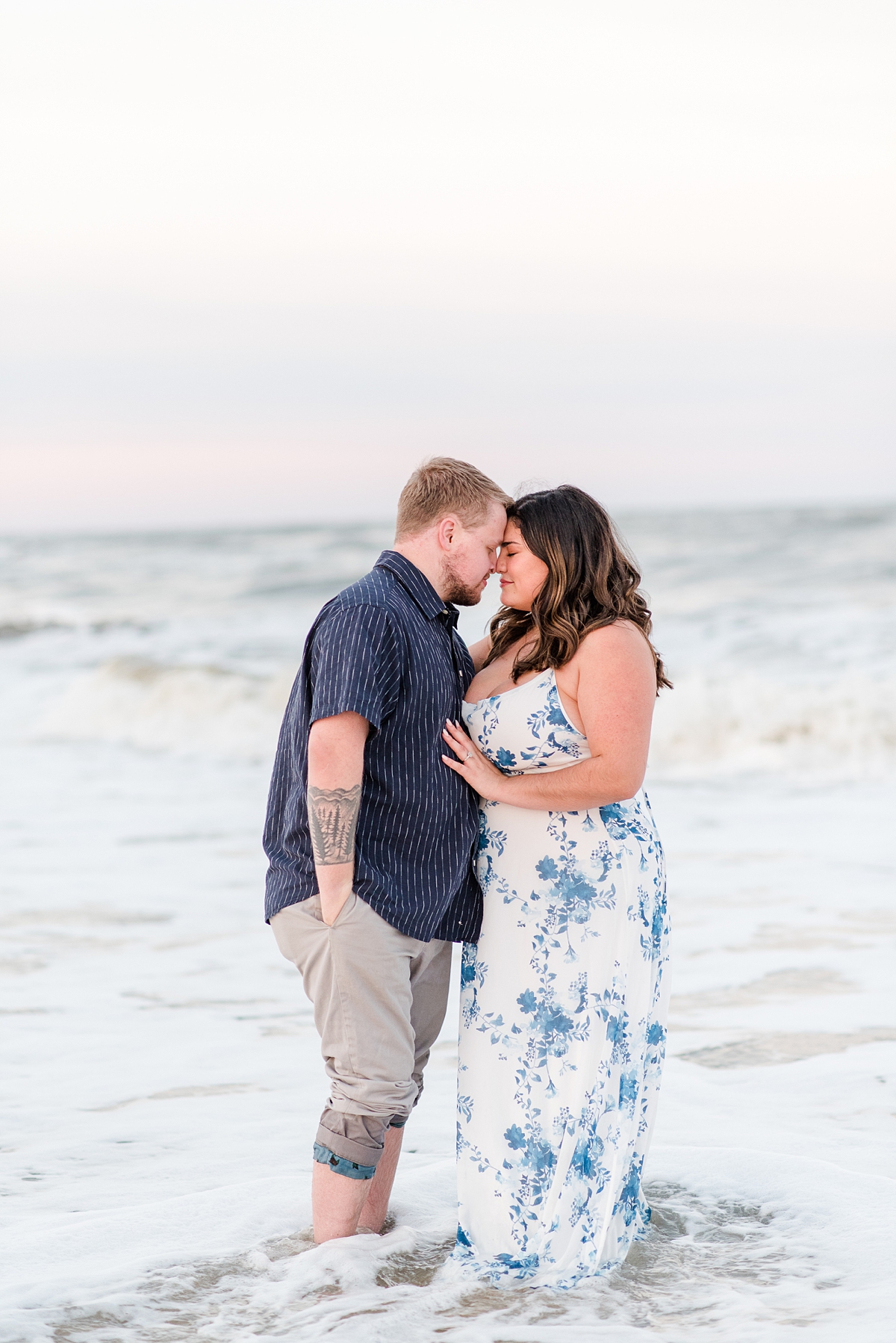Couple in the Water at Virginia Beach Engagement Session. Engagement Photography by Yorktown Wedding Photographer Kailey Brianne Photography. 