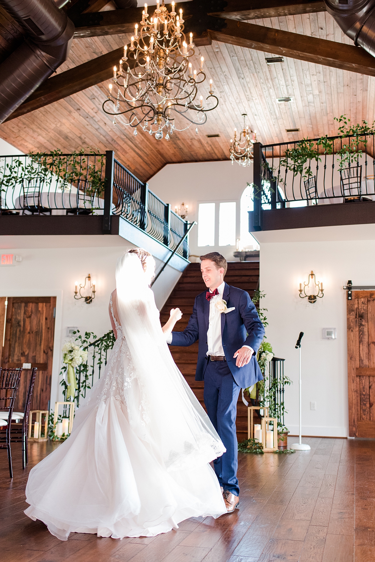 Groom Twirling Bride During First Dance at Burlington Fall Wedding Reception. Wedding Photography by Virginia Wedding Photographer Kailey Brianne Photography. 