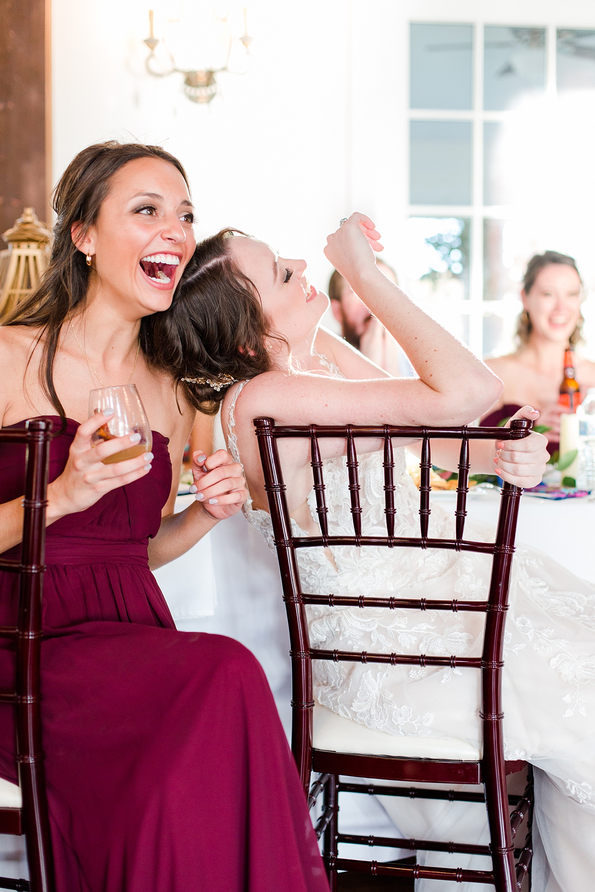 Bride and Bridesmaids Laughing at Surprise Dance by the Groom at Burlington Plantation Fall Wedding Reception. Wedding Photography by Virginia Wedding Photographer Kailey Brianne Photography. 