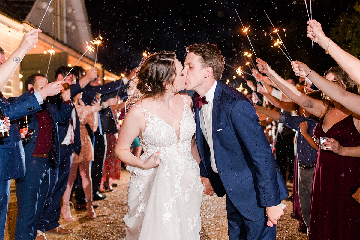 Sparkler Exit with Rain at Burlington Fall Wedding Reception. Wedding Photography by Richmond Wedding Photographer Kailey Brianne Photography. 