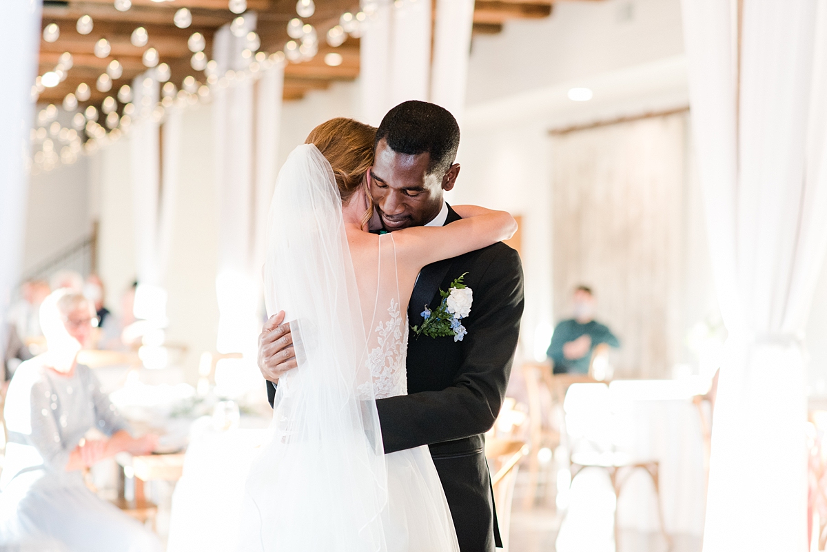 Bride and Groom First Dance During Granary at Valley Pike Rustic Wedding Reception. Wedding Photography by Virginia Wedding Photographer Kailey Brianne Photography. 