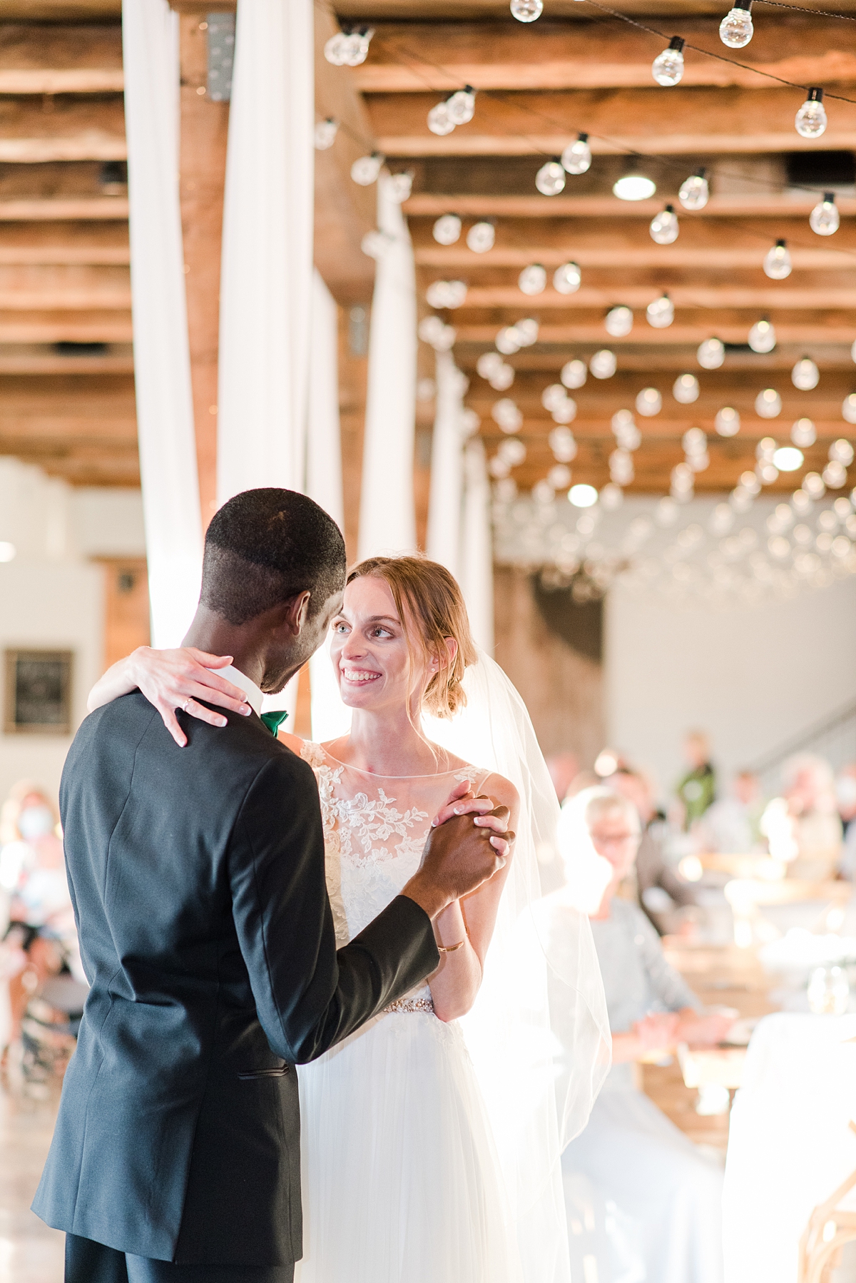 Bride and Groom First Dance During Granary at Valley Pike Rustic Wedding Reception. Wedding Photography by Virginia Wedding Photographer Kailey Brianne Photography. 