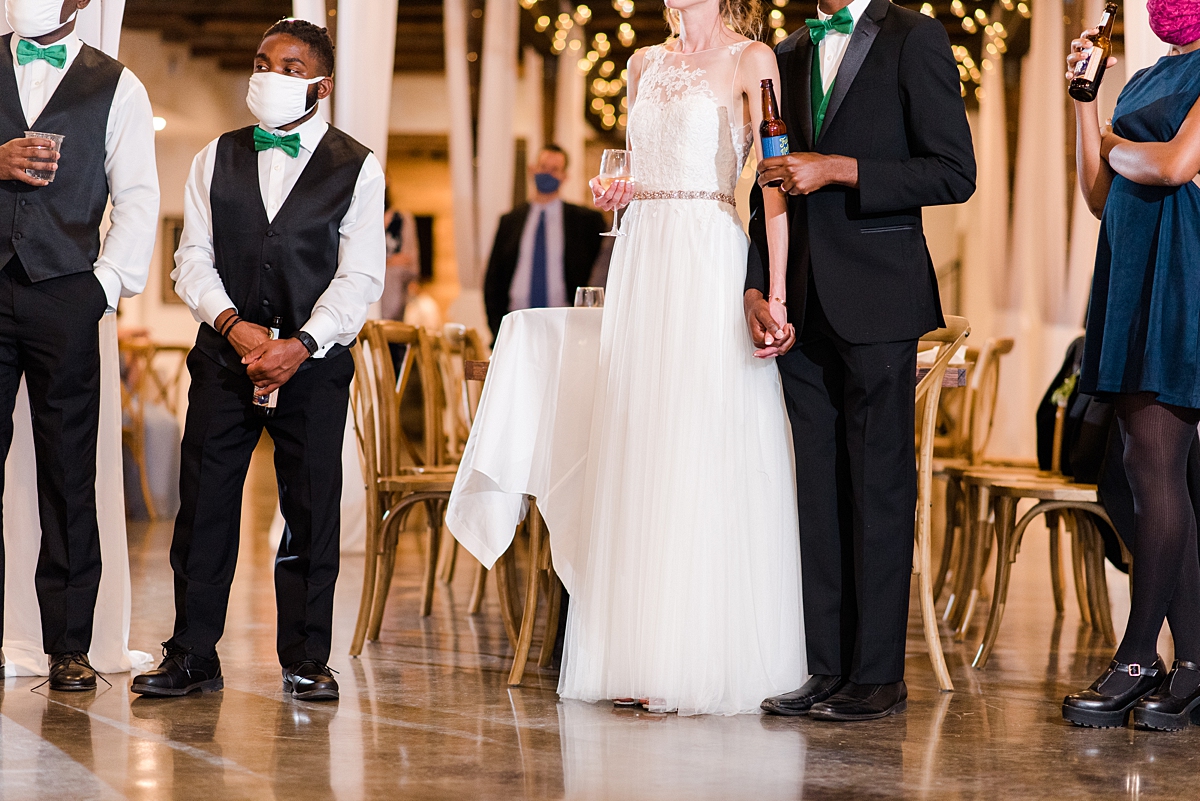 Bride and Groom During Toasts at Granary at Valley Pike Rustic Wedding Reception. Wedding Photography by Virginia Wedding Photographer Kailey Brianne Photography. 