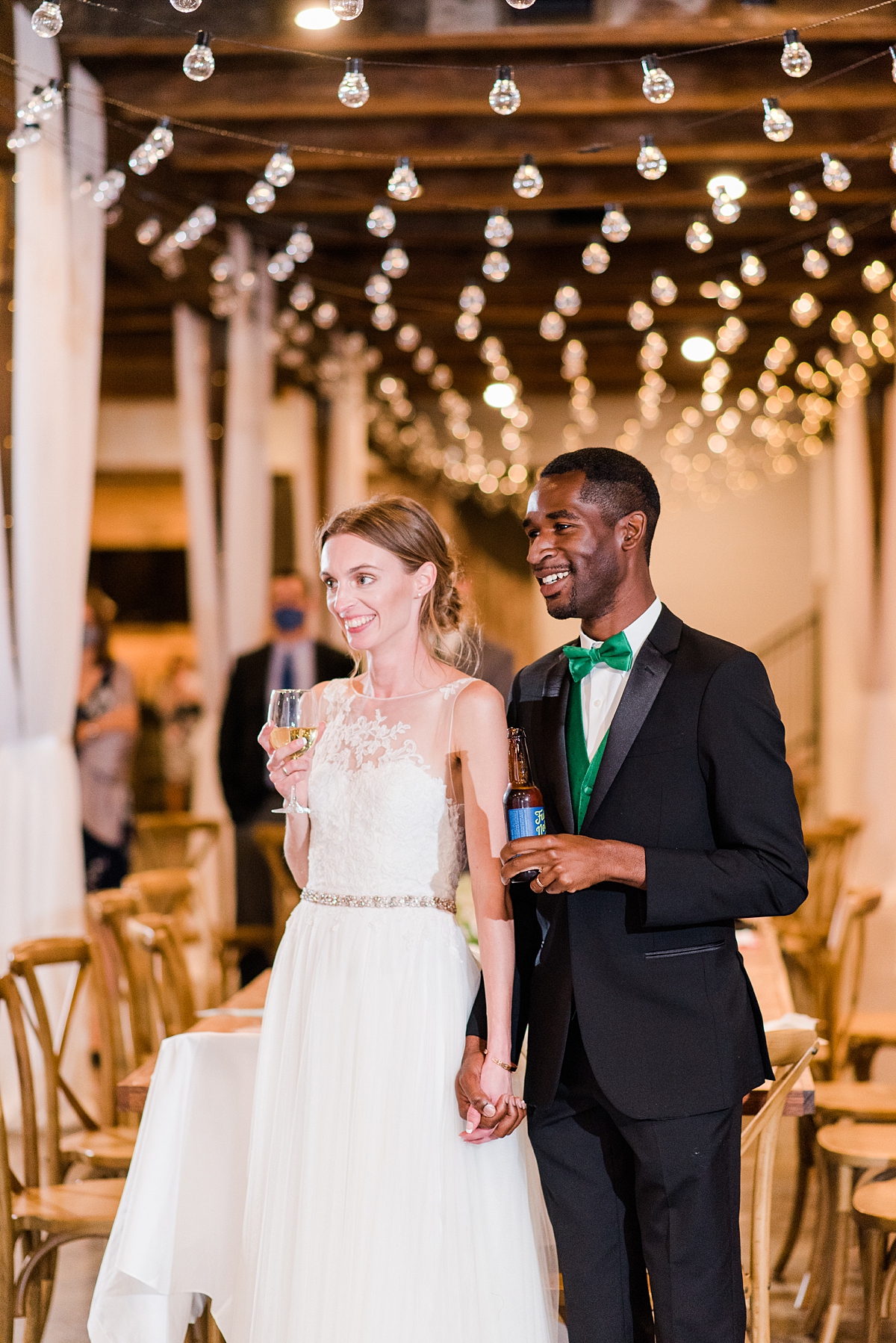 Bride and Groom During Toasts at Granary at Valley Pike Rustic Wedding Reception. Wedding Photography by Virginia Wedding Photographer Kailey Brianne Photography. 