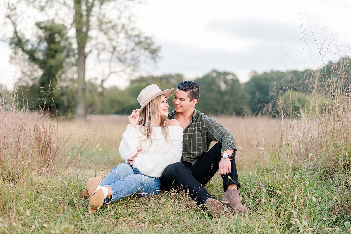 Stylish Engagement Outfit with Hat at Yorktown Battlefield Fall Engagement Session. Engagement Photography by Yorktown Wedding Photographer Kailey Brianne Photography. 