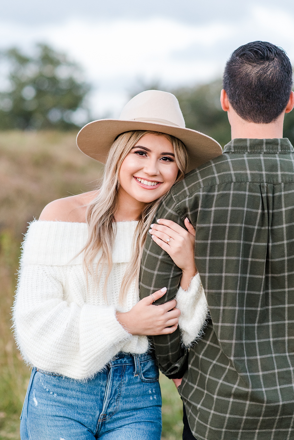 Stylish Engagement Outfit and Unique Poses with Engagement Ring at Yorktown Battlefield Fall Engagement Session. Engagement Photography by Virginia Beach Wedding Photographer Kailey Brianne Photography. 