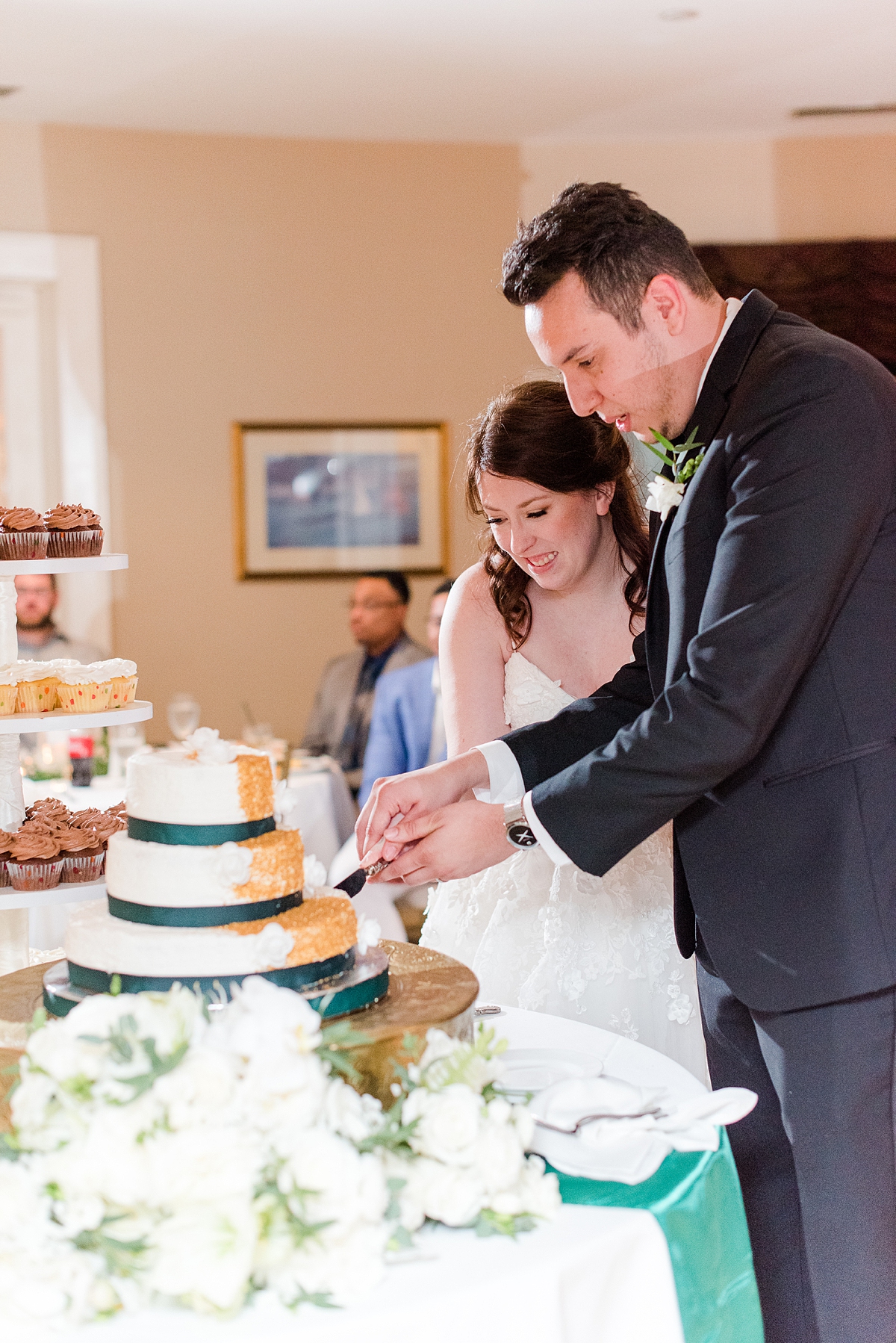 Cake Cutting at Dominion Club Fall Wedding Reception. Wedding Photography by Virginia Wedding Photographer Kailey Brianne Photography.