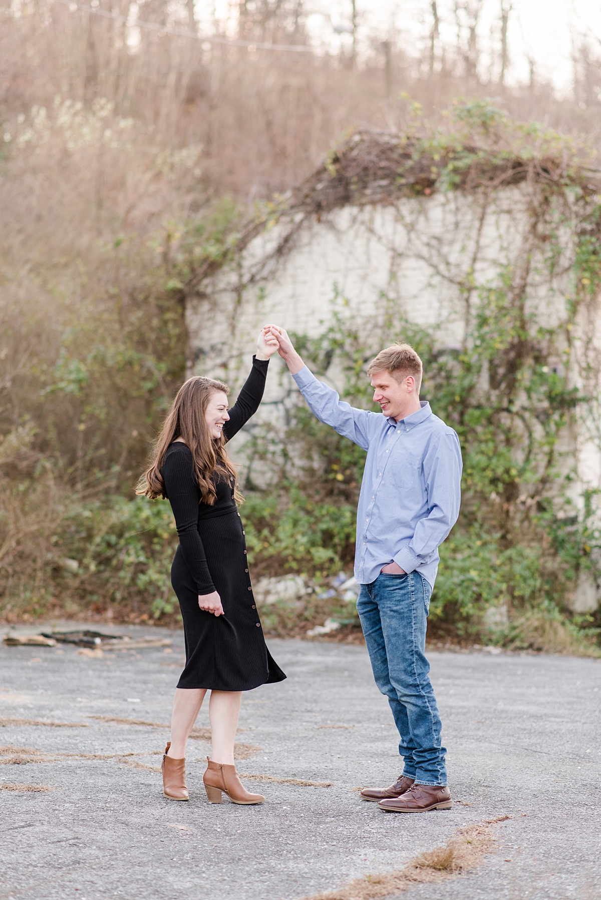 Twirling at Fall Rockfish Gap Overlook Engagement Session. Photography by Richmond Wedding Photographer Kailey Brianne Photography.