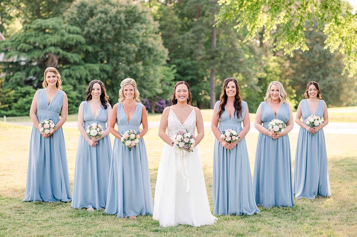 Bride and Bridesmaid Bouquets with Sola Wood Flowers at Spring Hanover wedding. Hanover Wedding Photographer Kailey Brianne Photography. 
