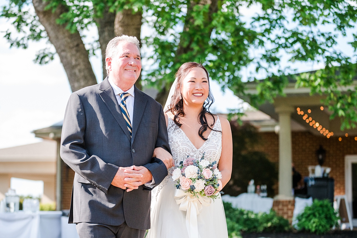 Wedding Ceremony with beautiful arch at Hanover Golf Club spring wedding. Photography by Virginia Wedding Photographer Kailey Brianne Photography. 