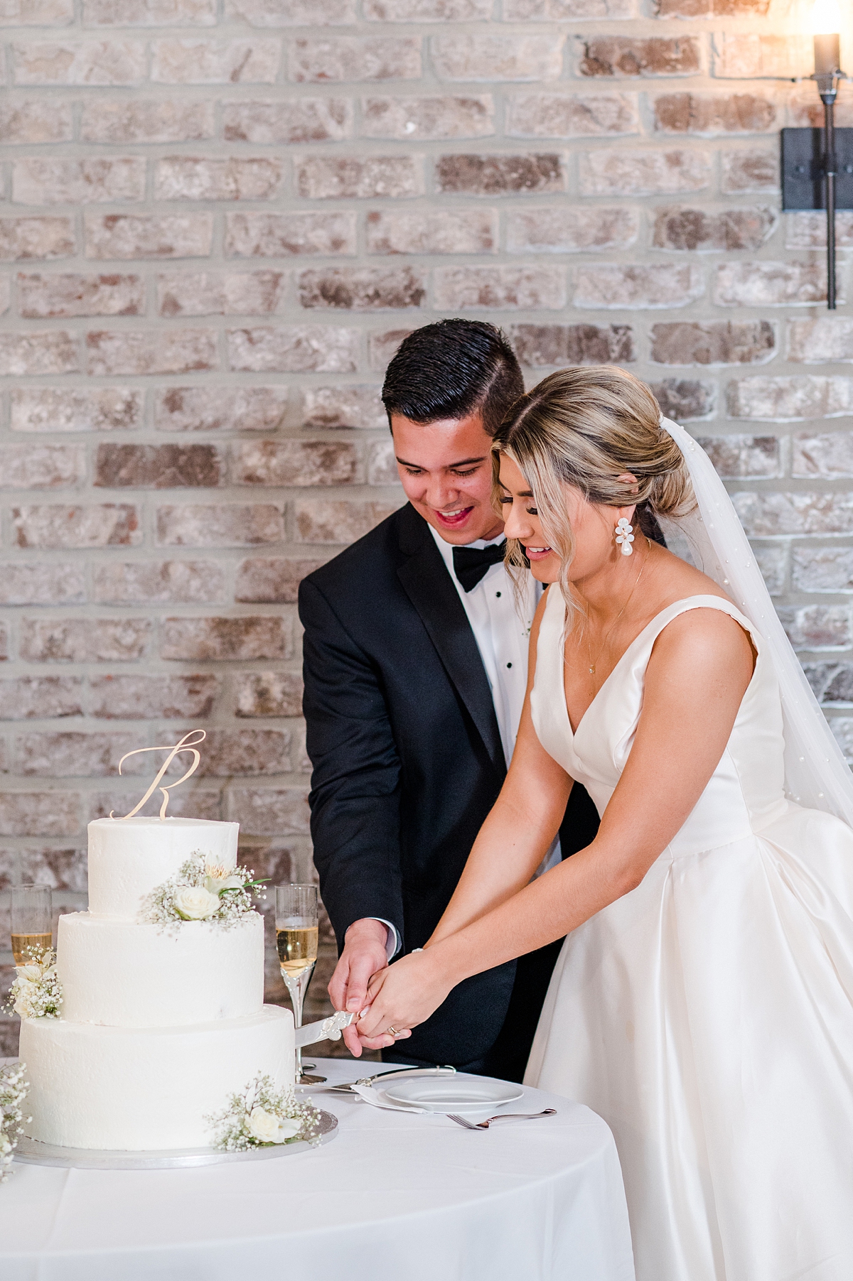 Cake Cutting during Spring Oakdale RVA Wedding Reception. Wedding Photography by Richmond Wedding Photographer Kailey Brianne Photography. 