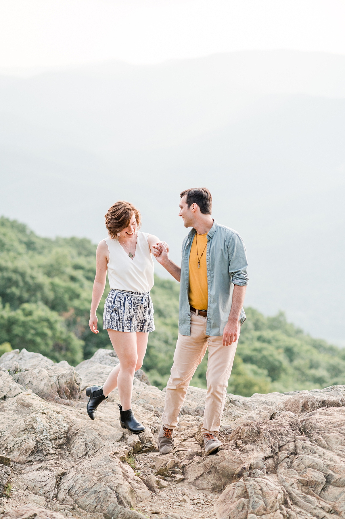 A Summer Raven's Roost Overlook Engagement Session with Mountain Views by Virginia Wedding Photographer Kailey Brianne Photography. 