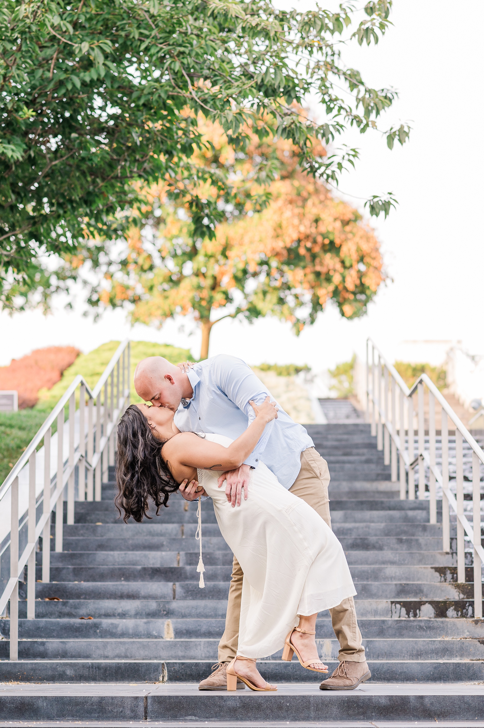 Dip Kiss During A Virginia Museum of Fine Arts Engagement Session in Downtown Richmond. Photography by Virginia Wedding Photographer Kailey Brianne Photography. 