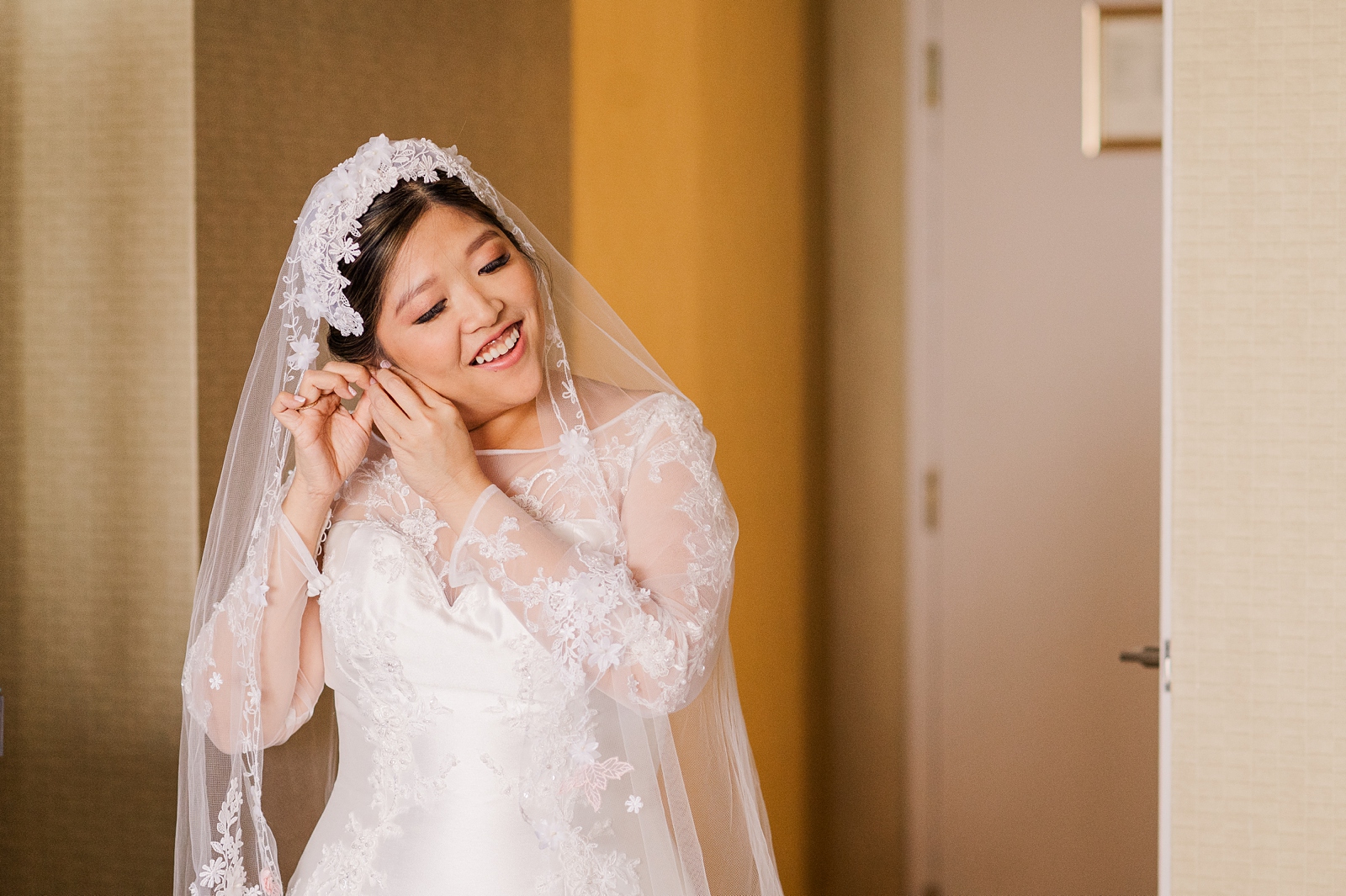 Bride Getting Ready at Richmond Omni Hotel Intimate Wedding. Photography by Virginia Intimate Wedding Photographer Kailey Brianne Photography.
