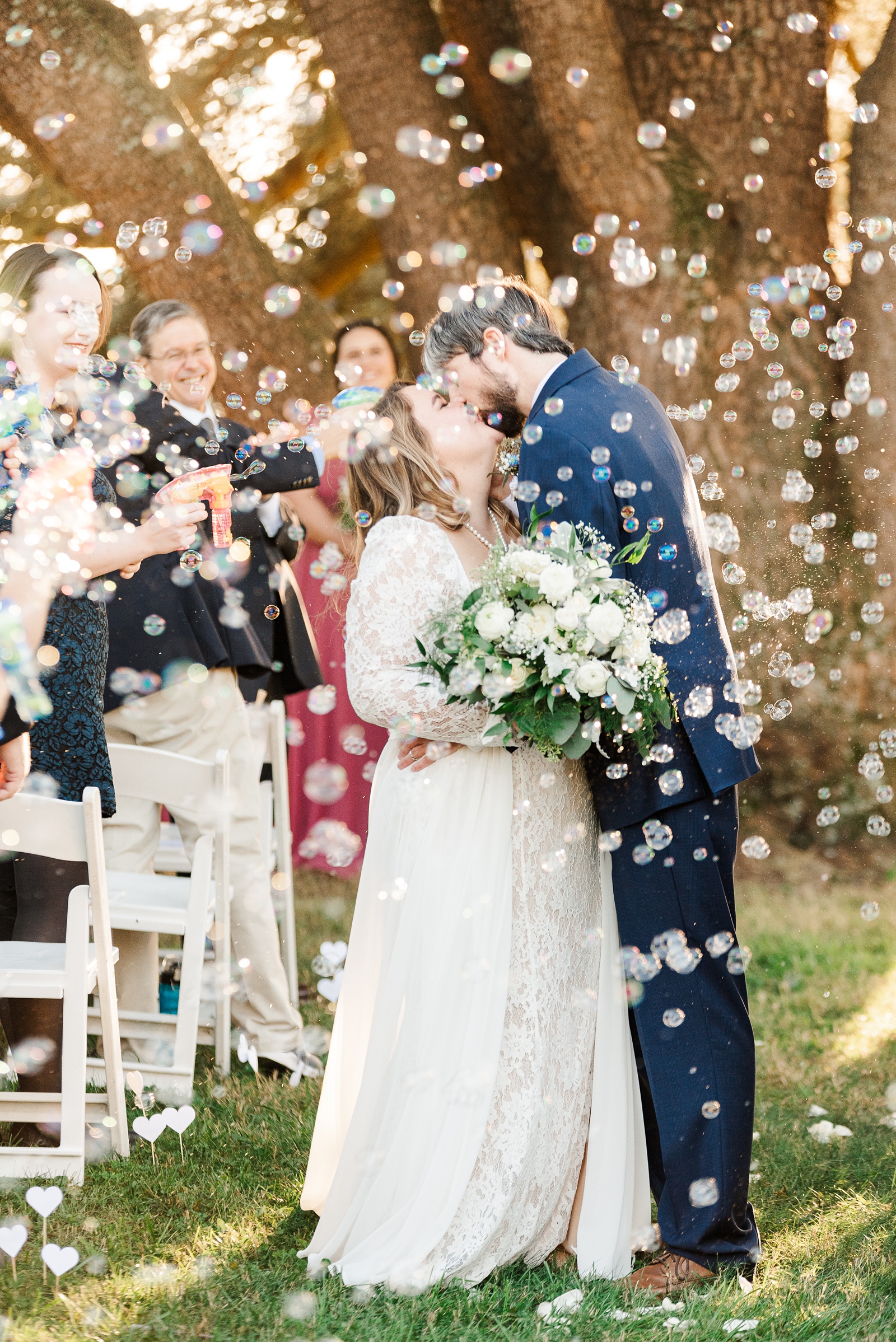 Ceremony Bubble Exit under Blue Cedar Atlas Tree at Fall Maymont Wedding. Photography by Virginia Wedding Photographer Kailey Brianne Photography.