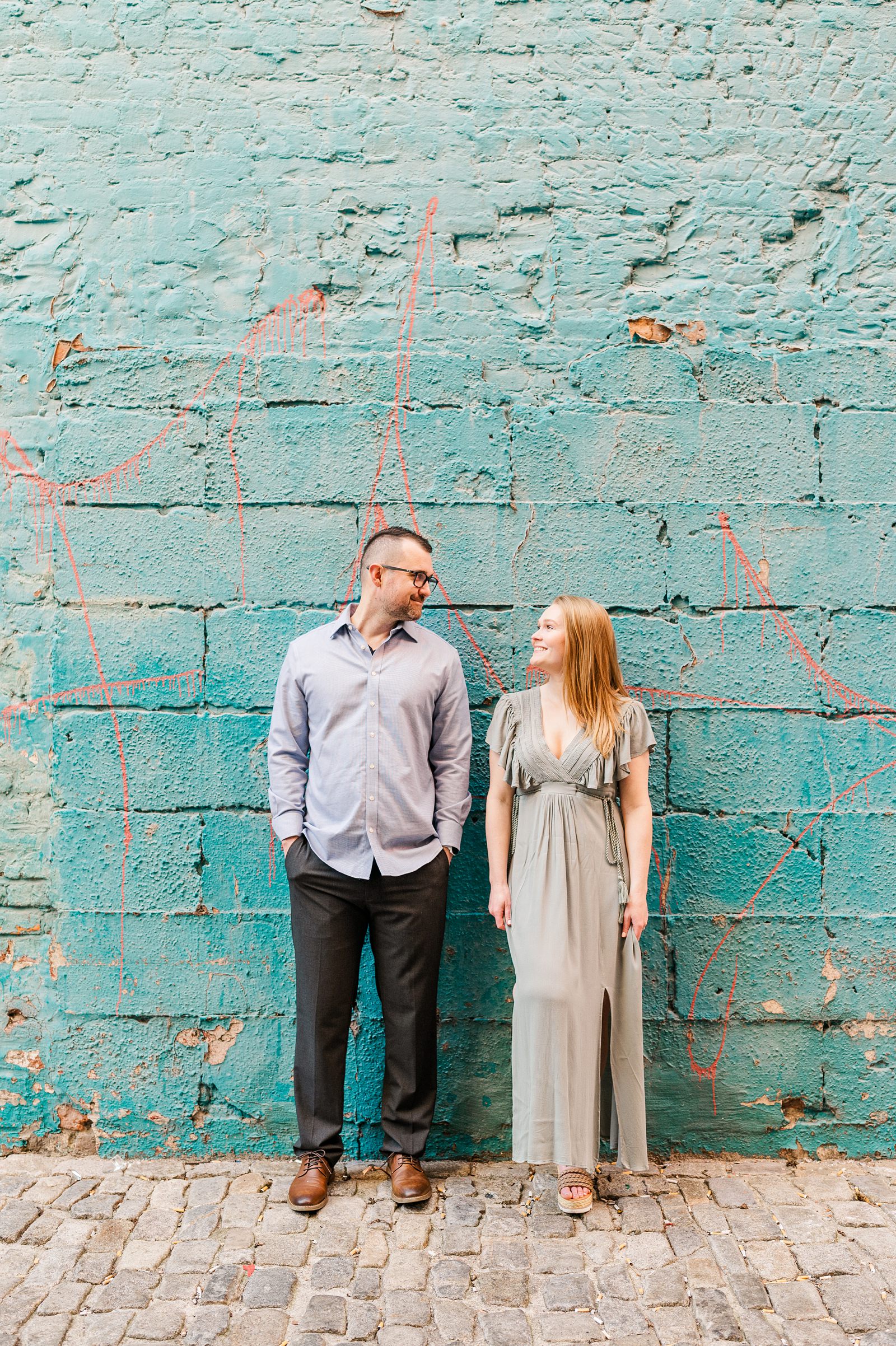 Downtown Richmond Engagement Session with Colorful Blue Wall by Urban Farmhouse. Wedding Photographer Kailey Brianne Photography