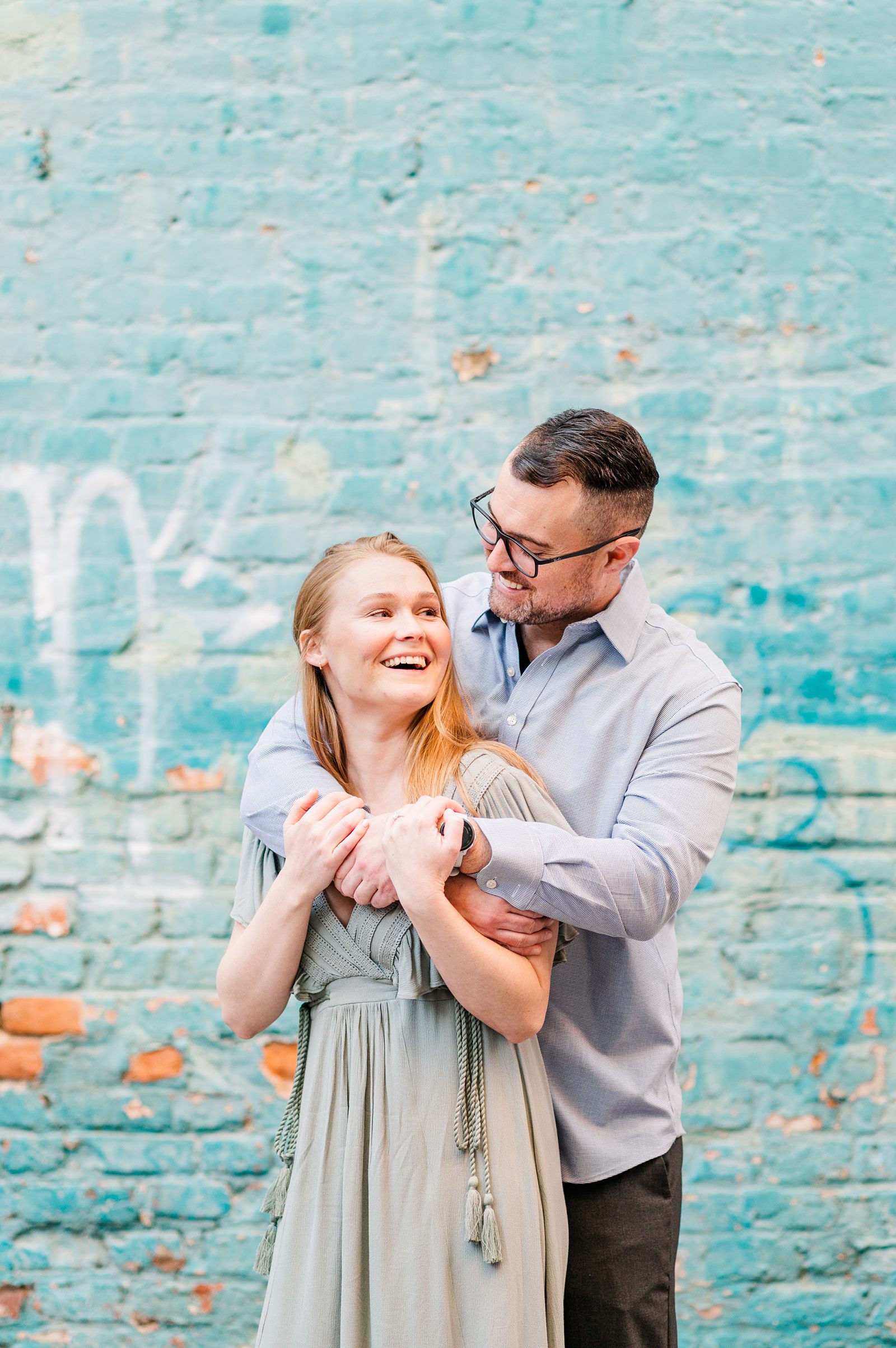 Downtown Richmond Engagement Session with Colorful Blue Wall by Urban Farmhouse. Wedding Photographer Kailey Brianne Photography