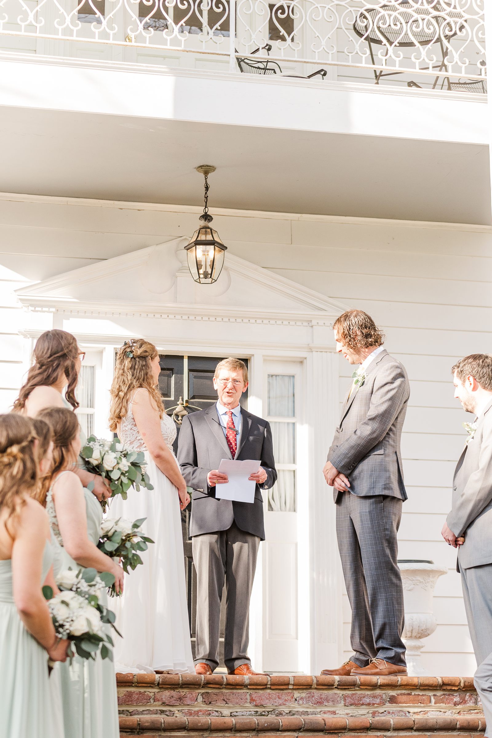 Bride and Groom during Spring Virginia Cliffe Inn Wedding Ceremony. Richmond Wedding Photographer Kailey Brianne Photography. 
