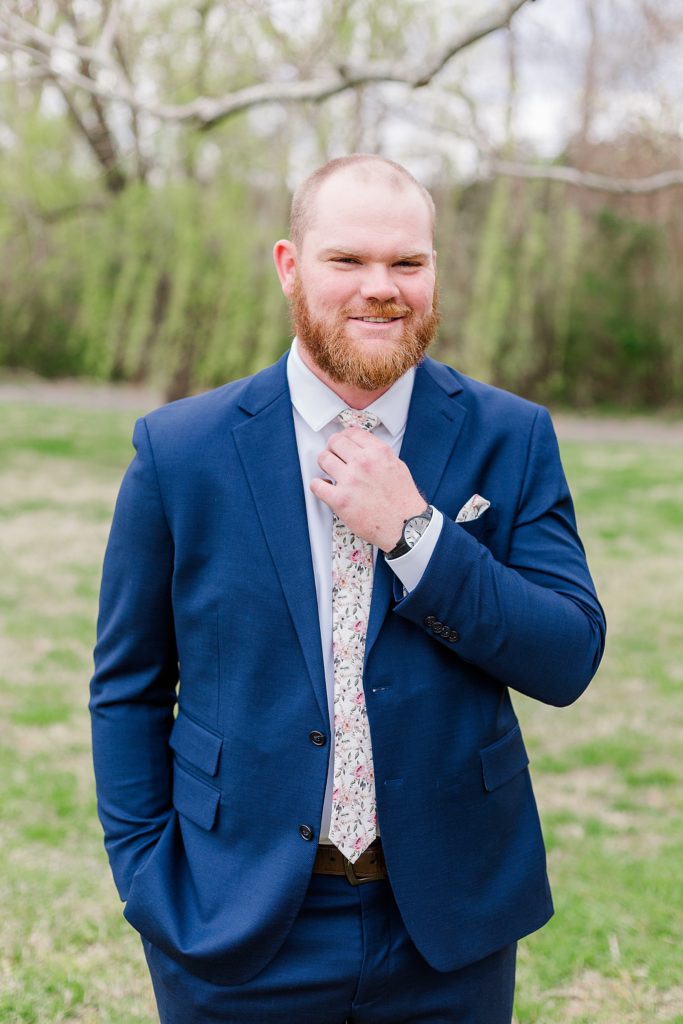 Groom with Navy Suit and Floral Tie at Lunenburg Waverly Estate Wedding
