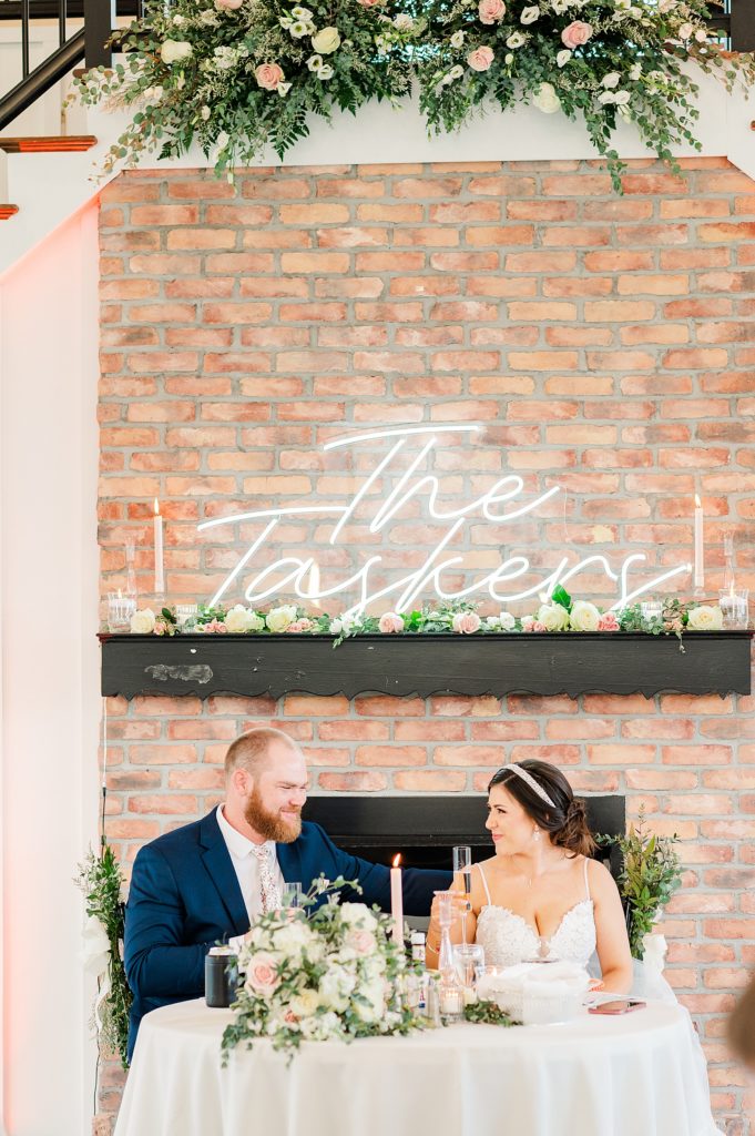 Bride and Groom with Custom Neon Sign at Waverly Estate Wedding Reception. Wedding Photography by Kailey Brianne Photography 