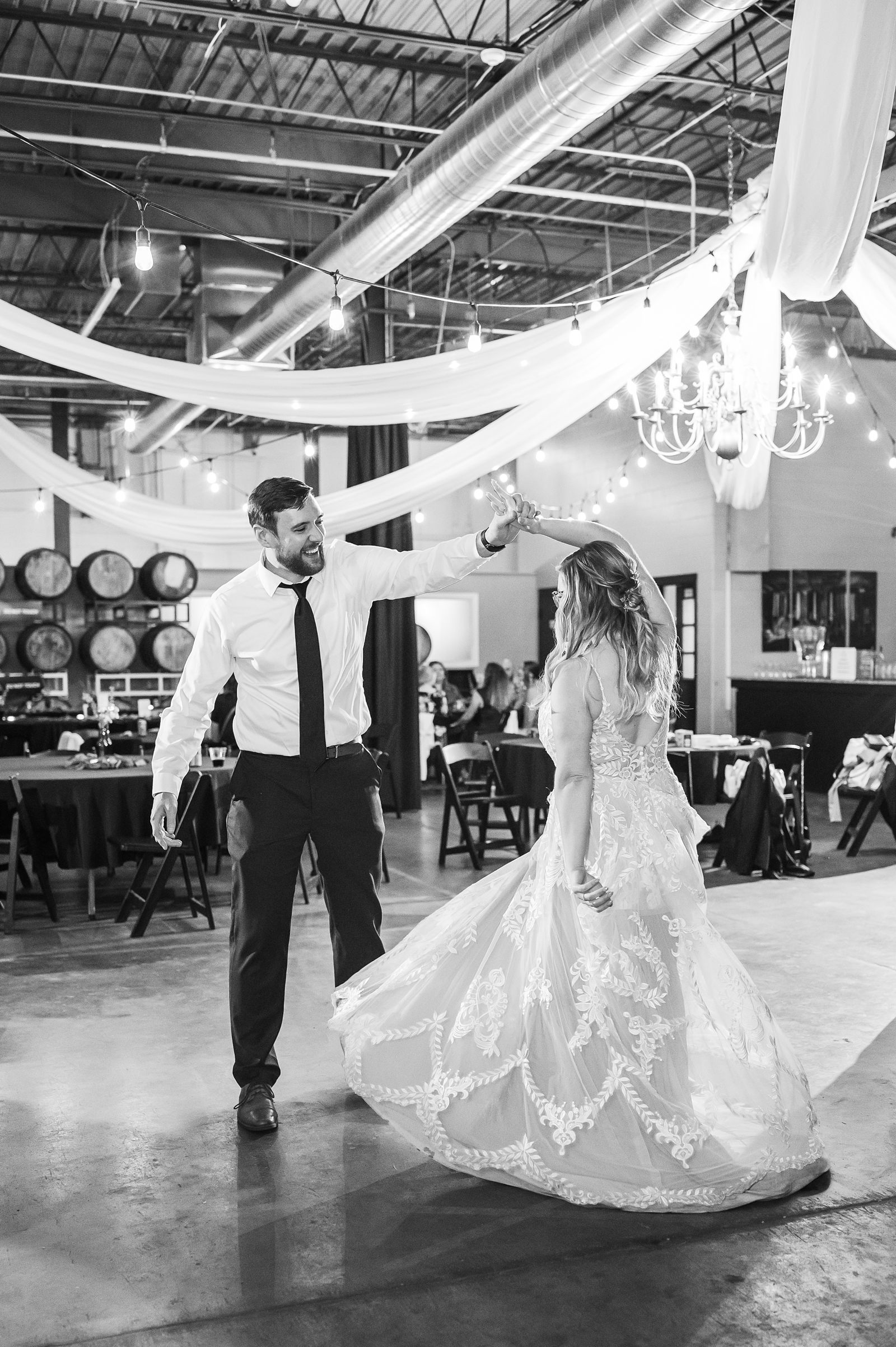 Bride and Groom Dancing During Reception at Triple Crossing Beer Wedding 