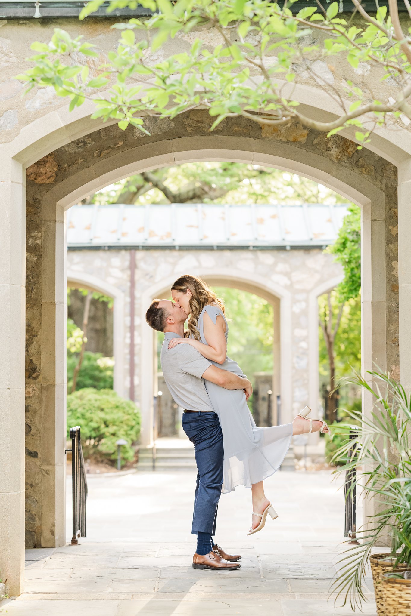 A Spring Richmond Engagement Session which arches and scissor kick kiss. 