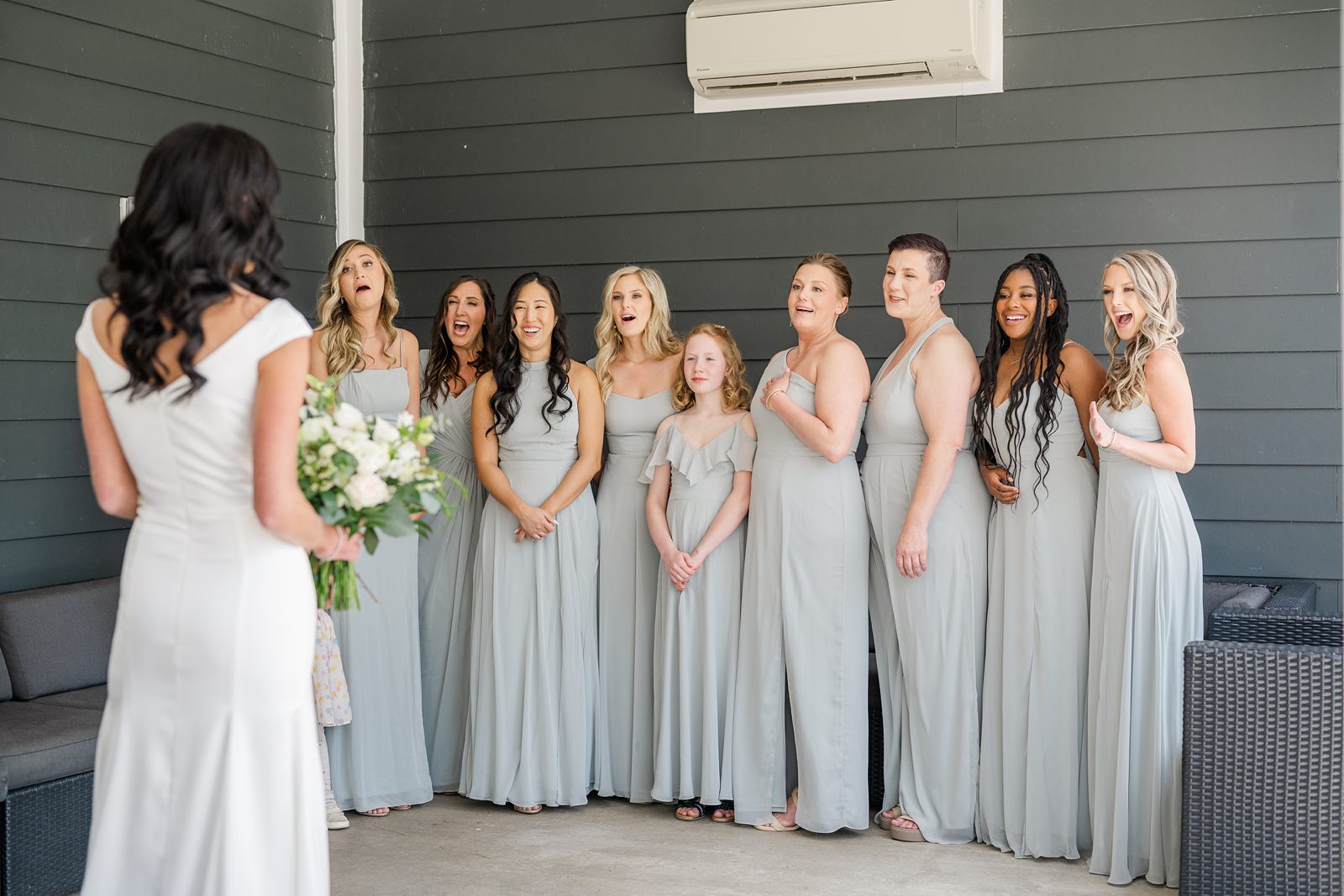 Bridesmaid reveal at backyard spring Virginia wedding with flower girl
