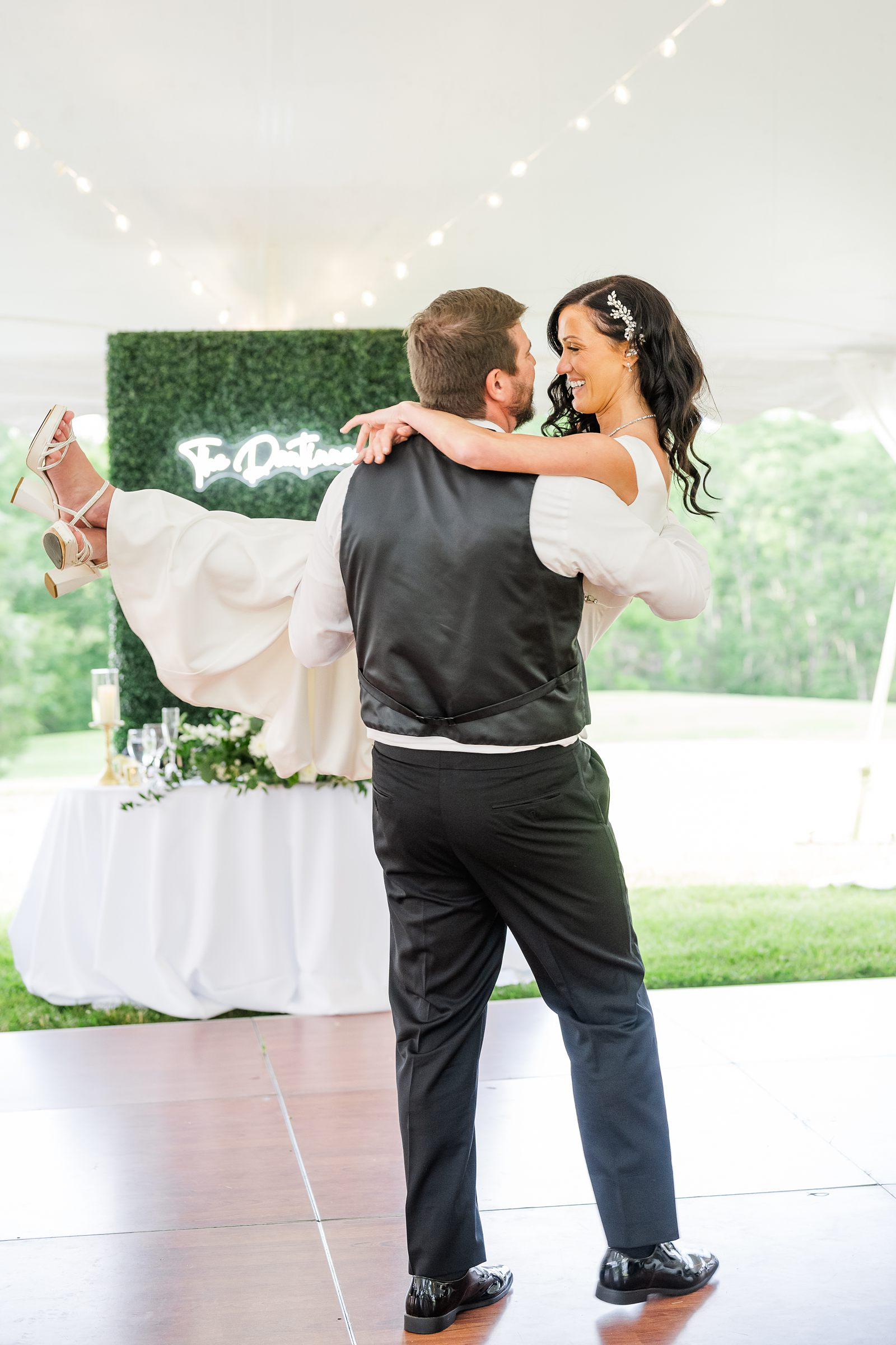 Bride and groom first dance at spring wedding reception by virginia wedding photographer 