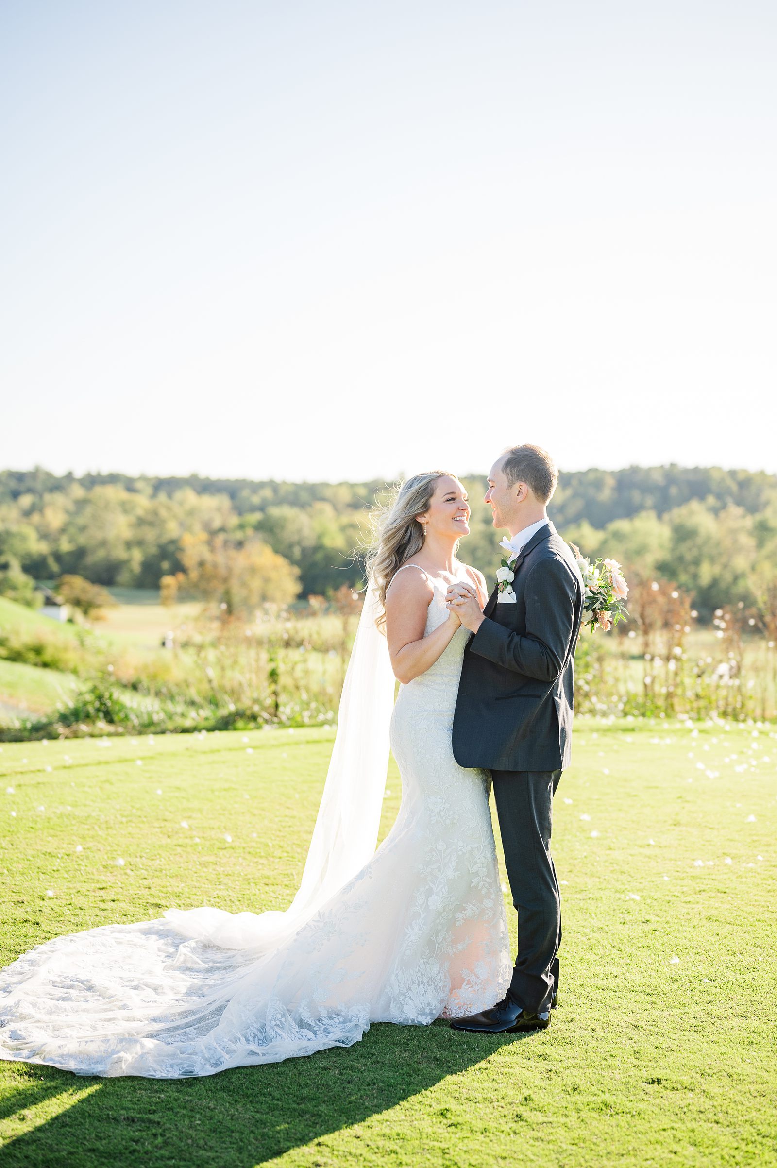 Bride and Groom portraits with veil in the mountains at the club at glenmore wedding in fall