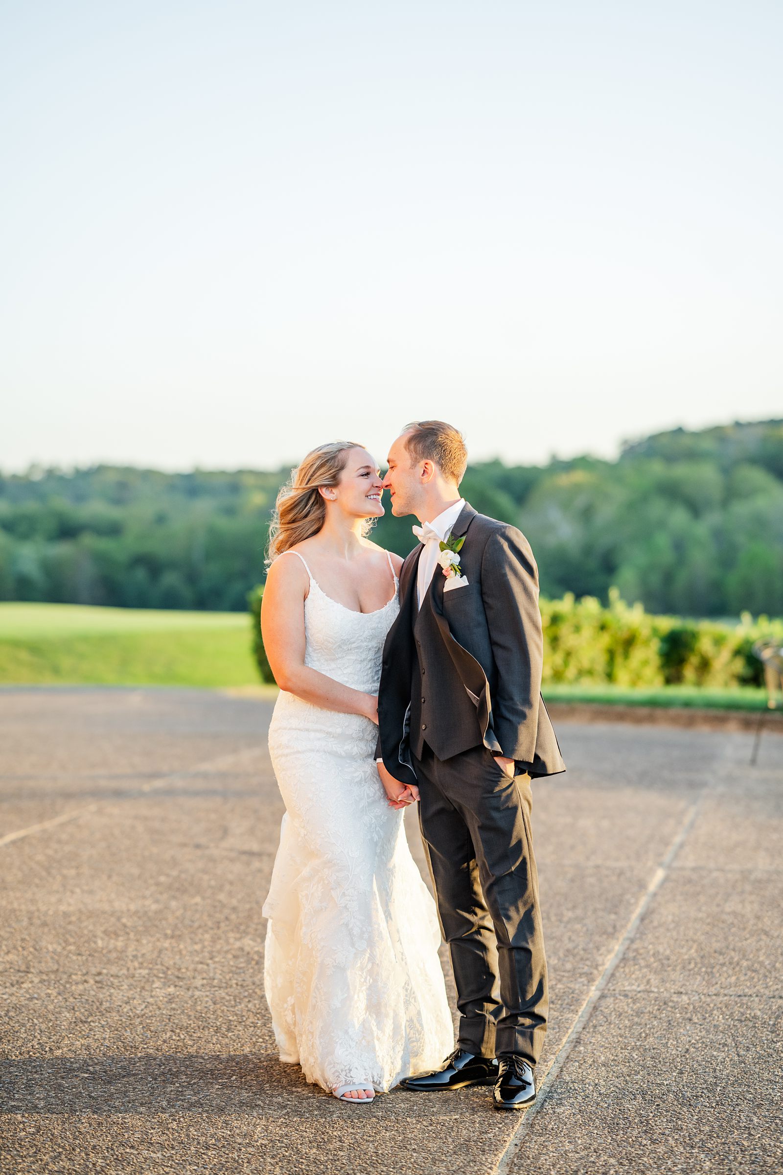 Sunset Portraits with bride and groom in the mountains at club at glenmore wedding